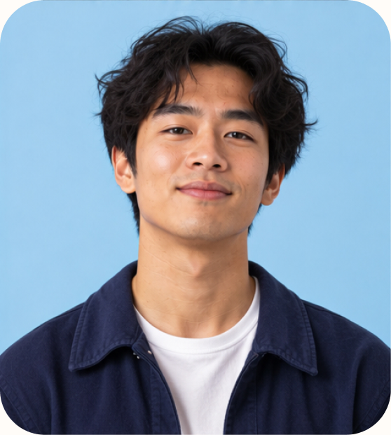 Smiling Aleph Forward Deployed Engineer trainee in a navy jacket