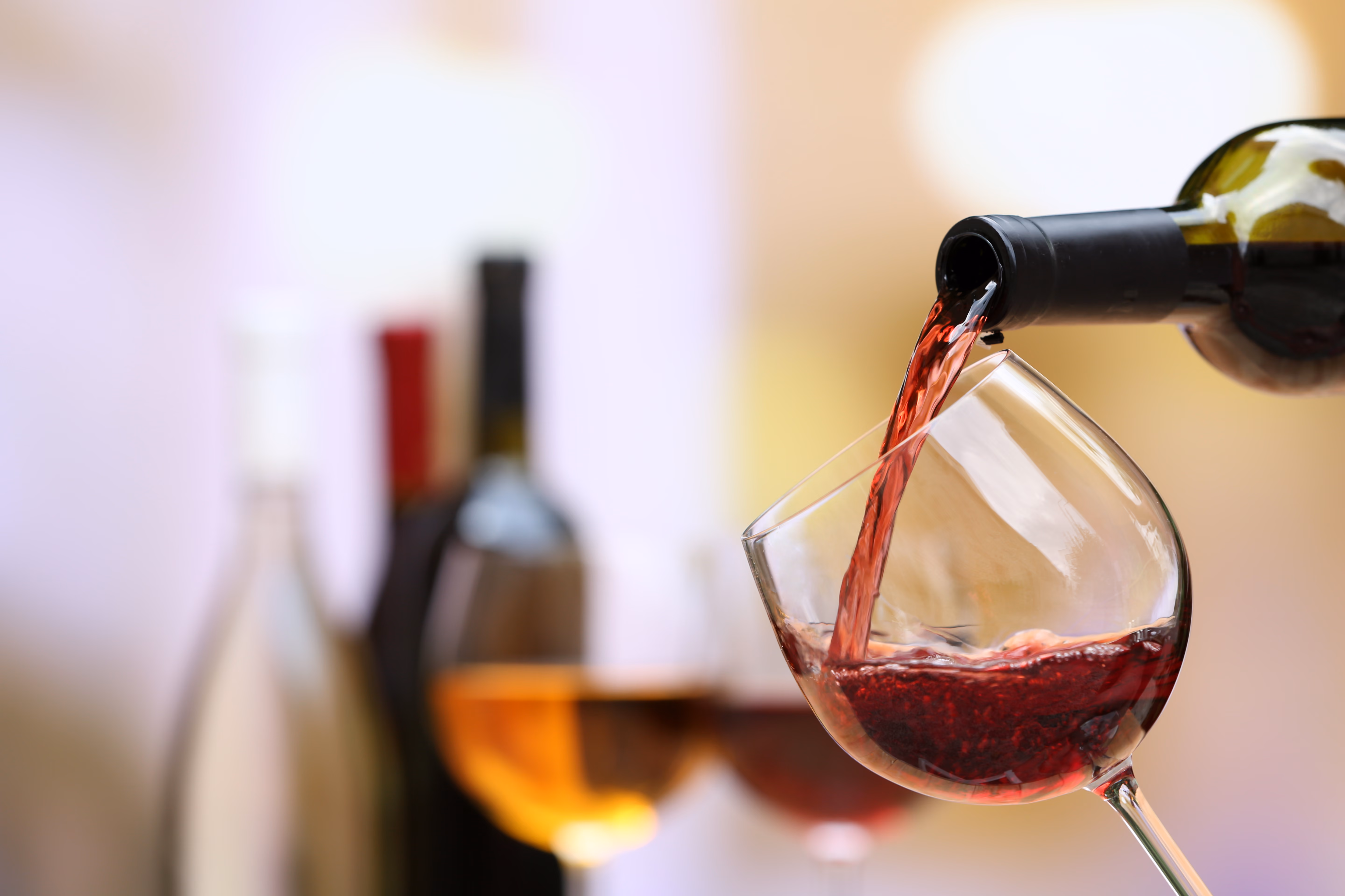 Pouring wine stock image