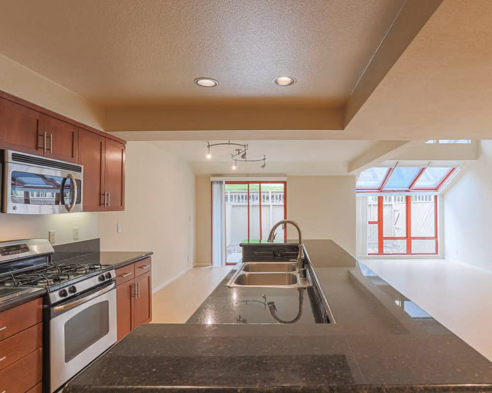 Apartment kitchen with a patio door