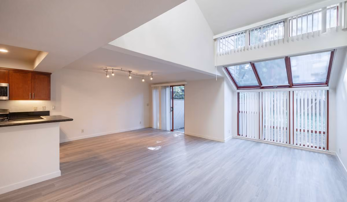 Living room with large windows and patio door