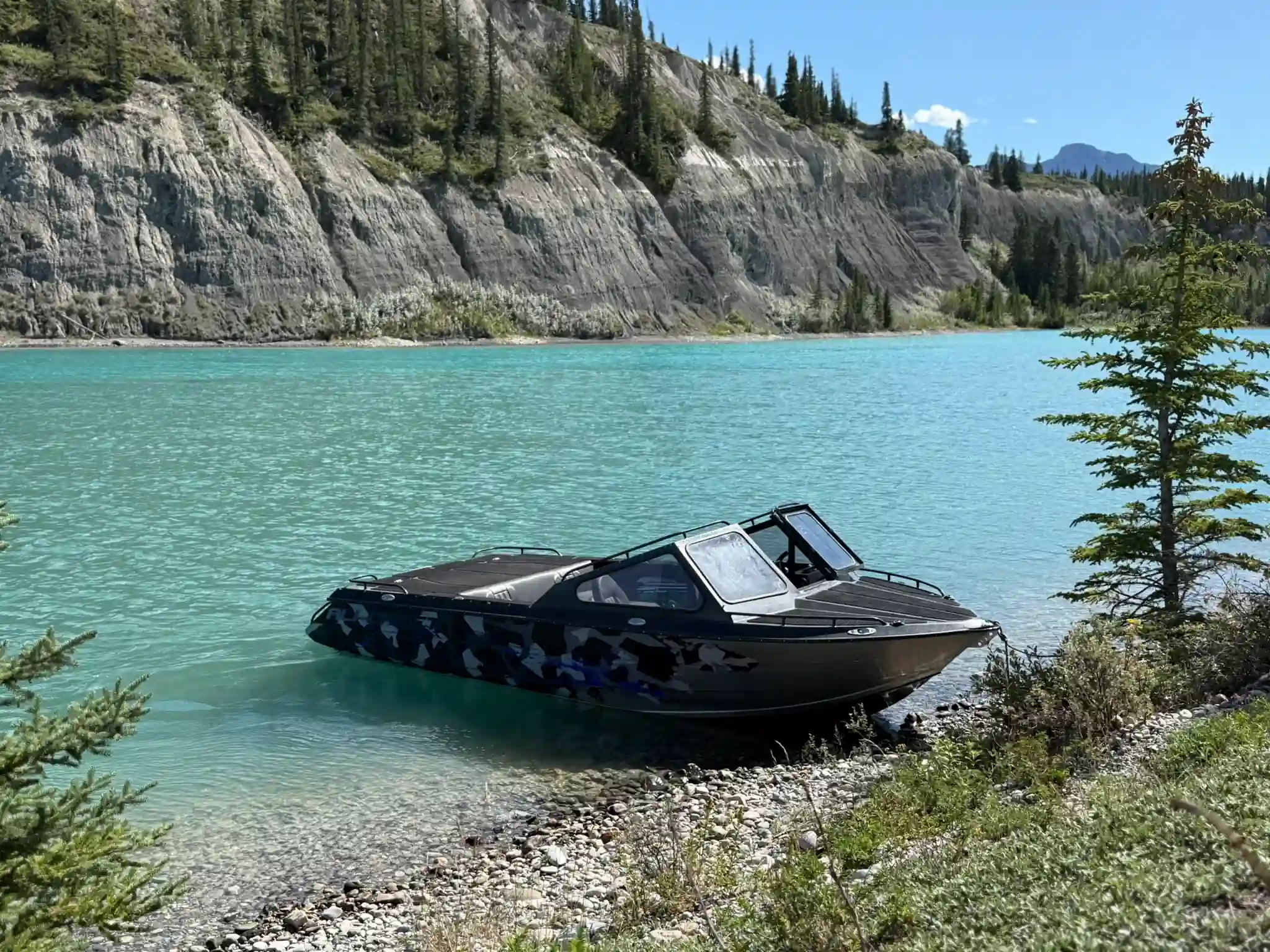 Explorer Ali-Craft Boat in crystal blue lake/river