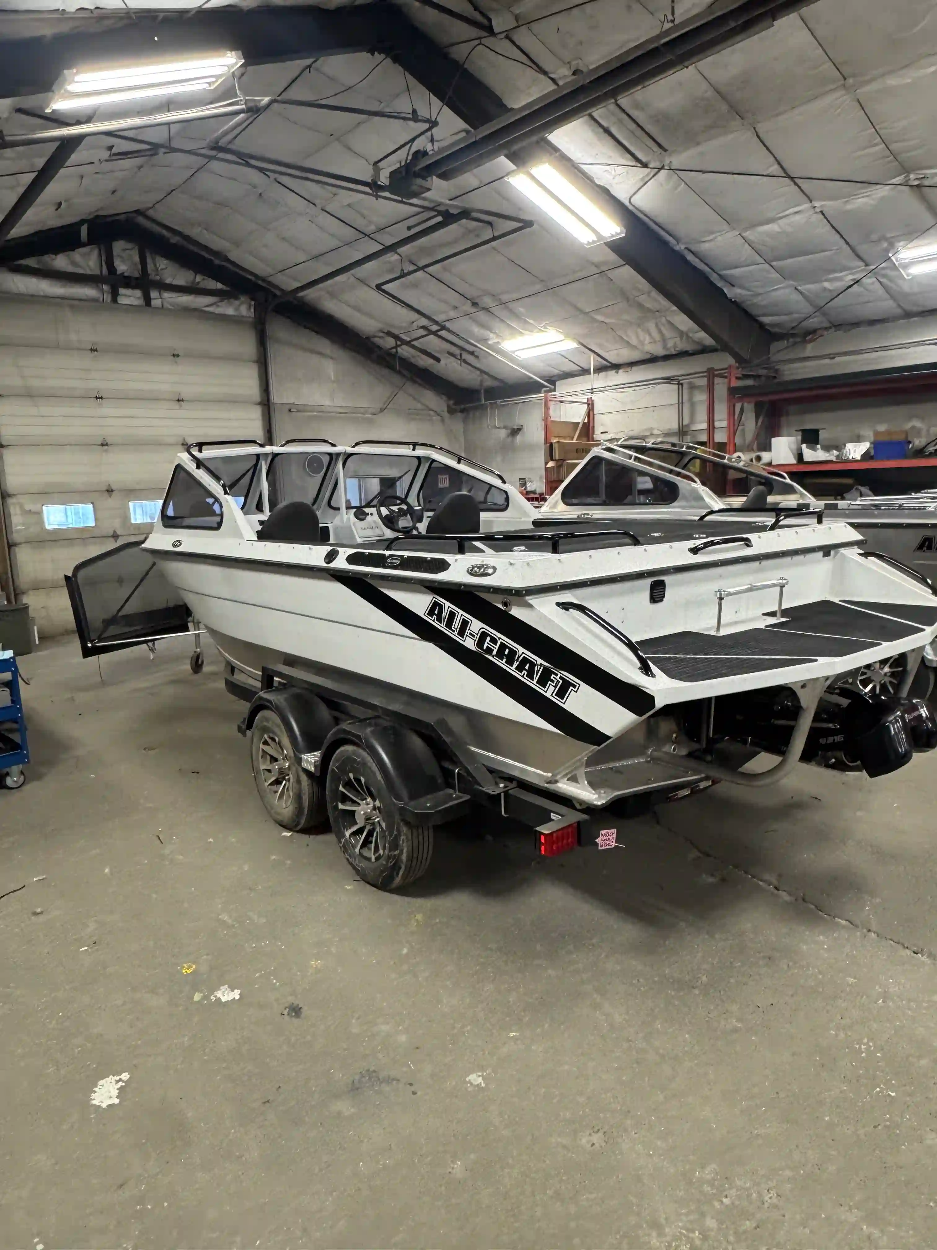 Ali-Craft custom boat in garage