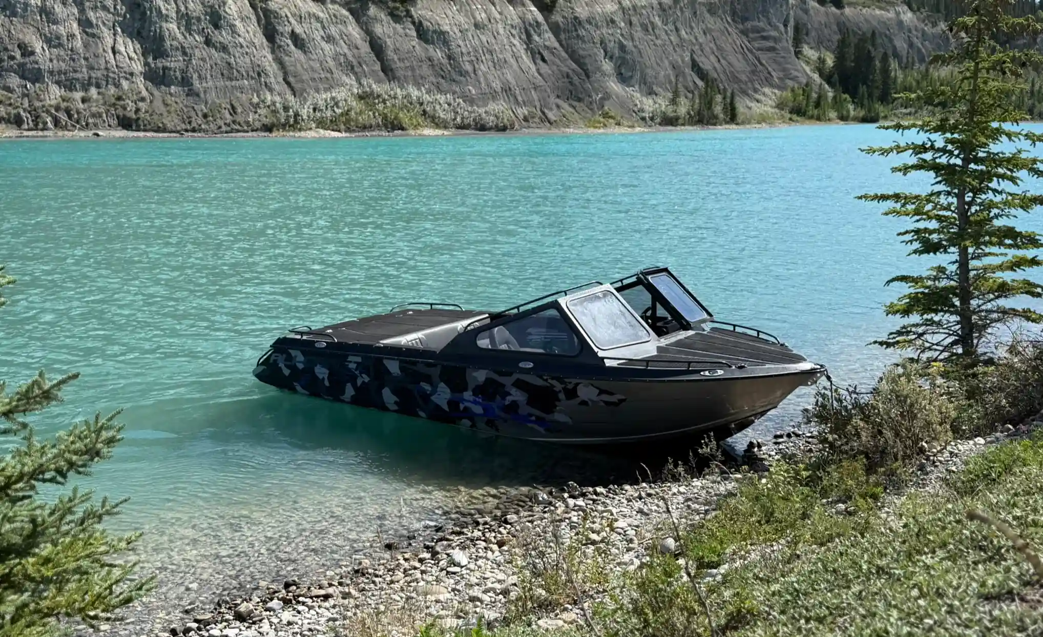 Explorer Ali-Craft Boat in crystal blue lake/river