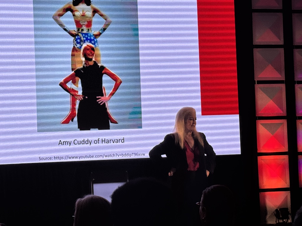 Presenter on stage at the WealthWave convention