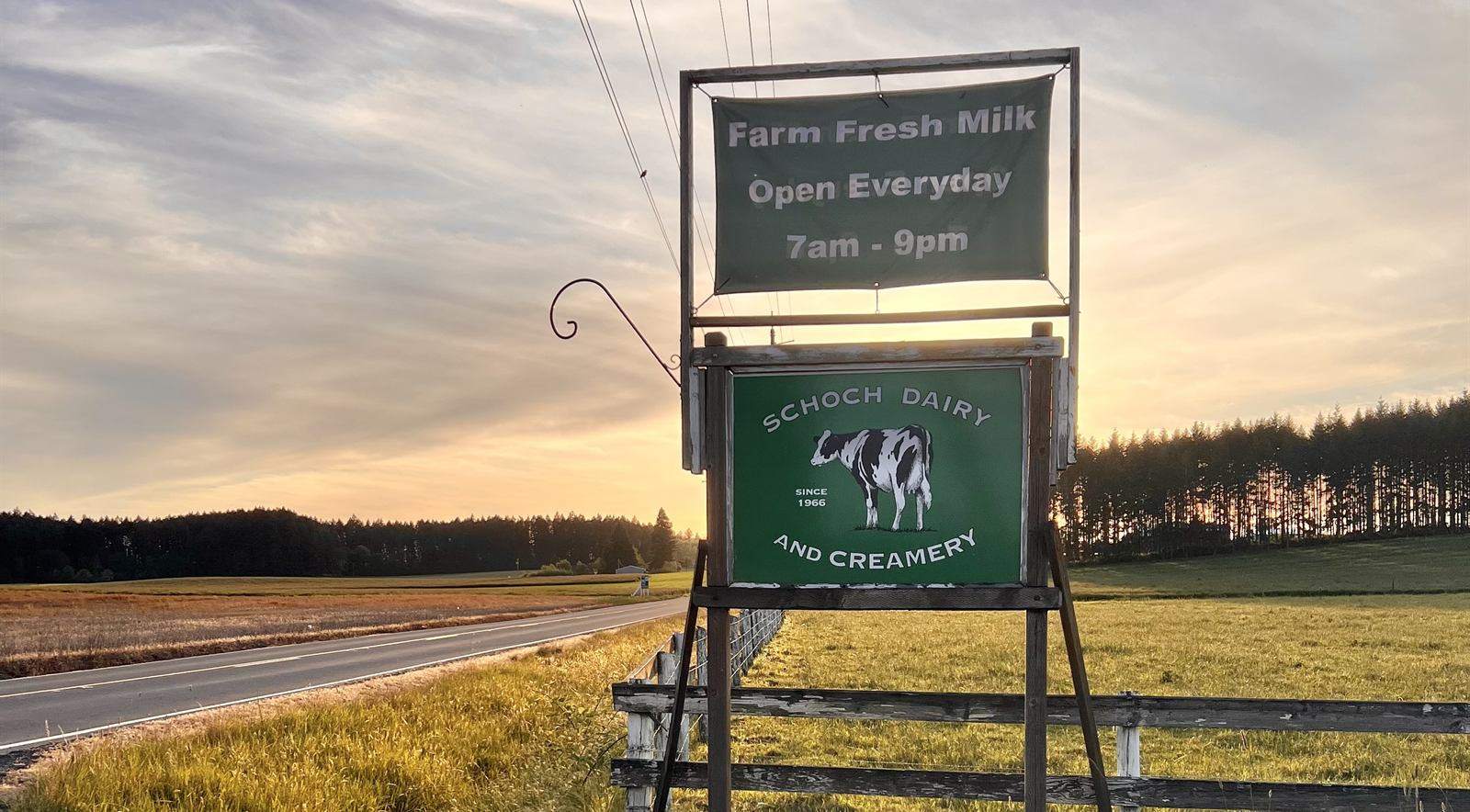 The Schoch Dairy and Creamery roadside sign at sunset on NW West Union Road — farm fresh milk, open every day 7 AM to 9 PM