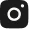 Icon of a camera with a circular lens and flash symbol.