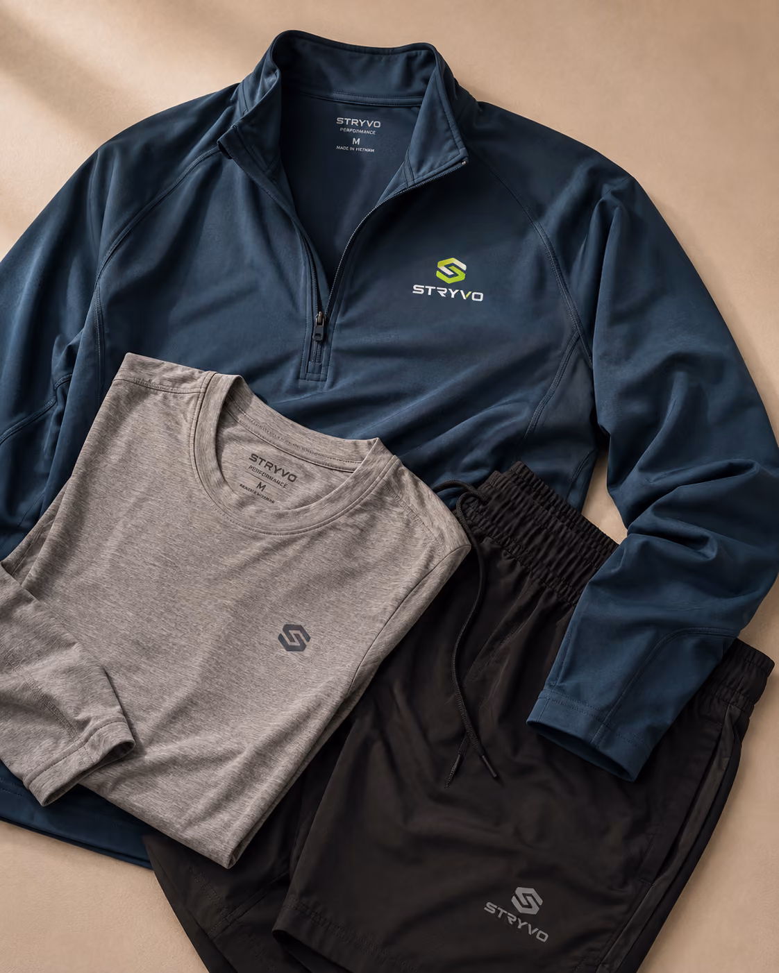 Branded quarter-zip training top with tee and shorts