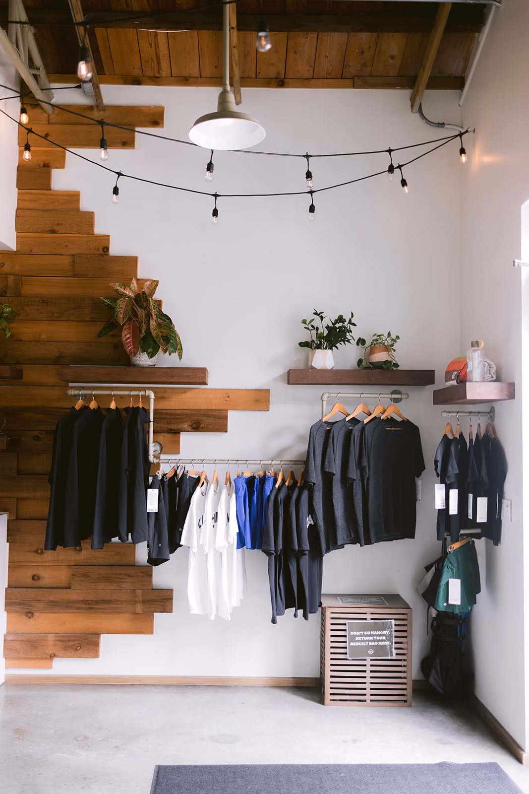 CAMP Tampa interior image of branded clothing and merchandise