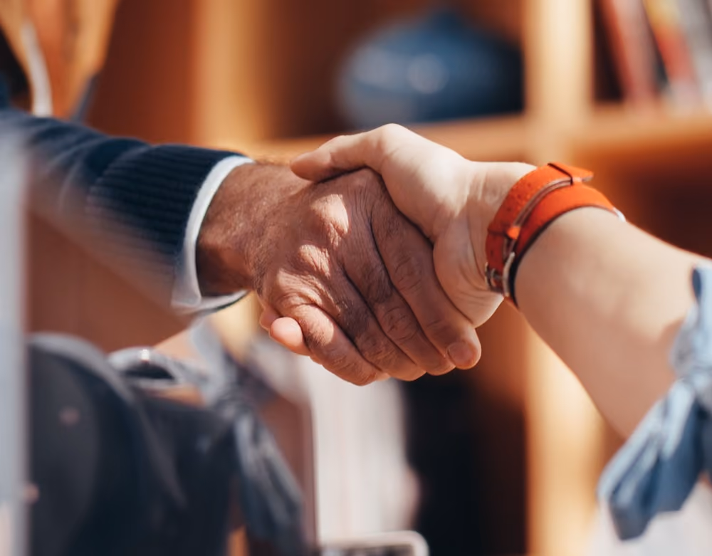 Close-up of a handshake