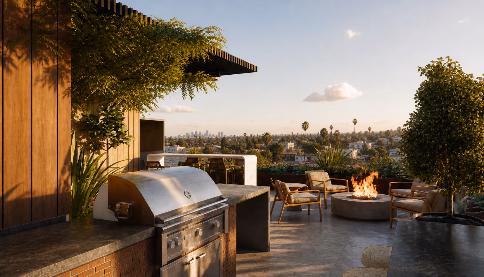 Outdoor patio with a built-in grill, seating around a fire pit, plants, and city skyline in distance.