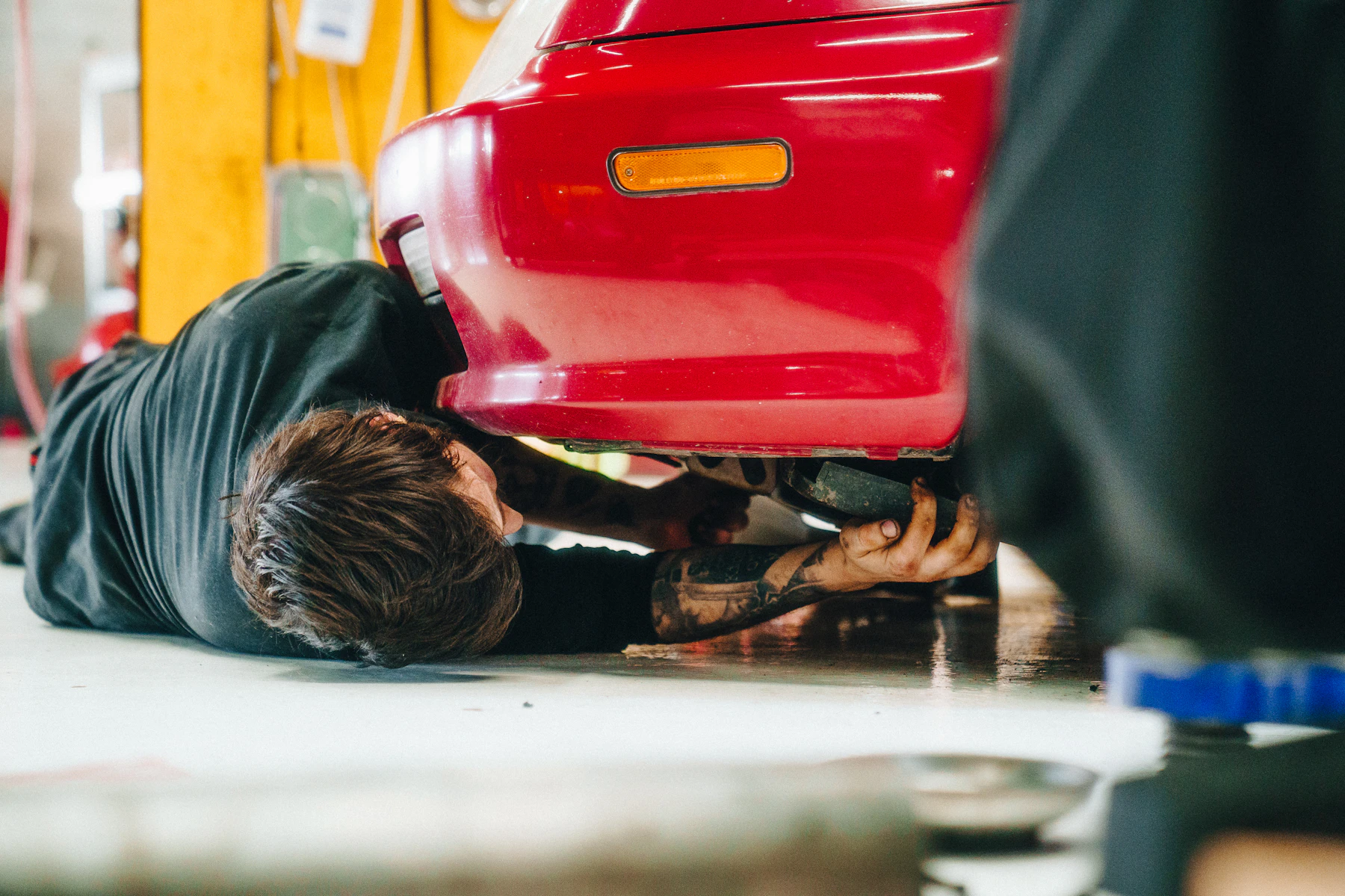 Mechanic performing auto repair