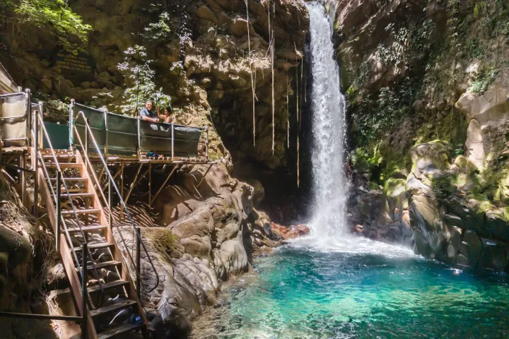 Viewing platform at a turquoise waterfall