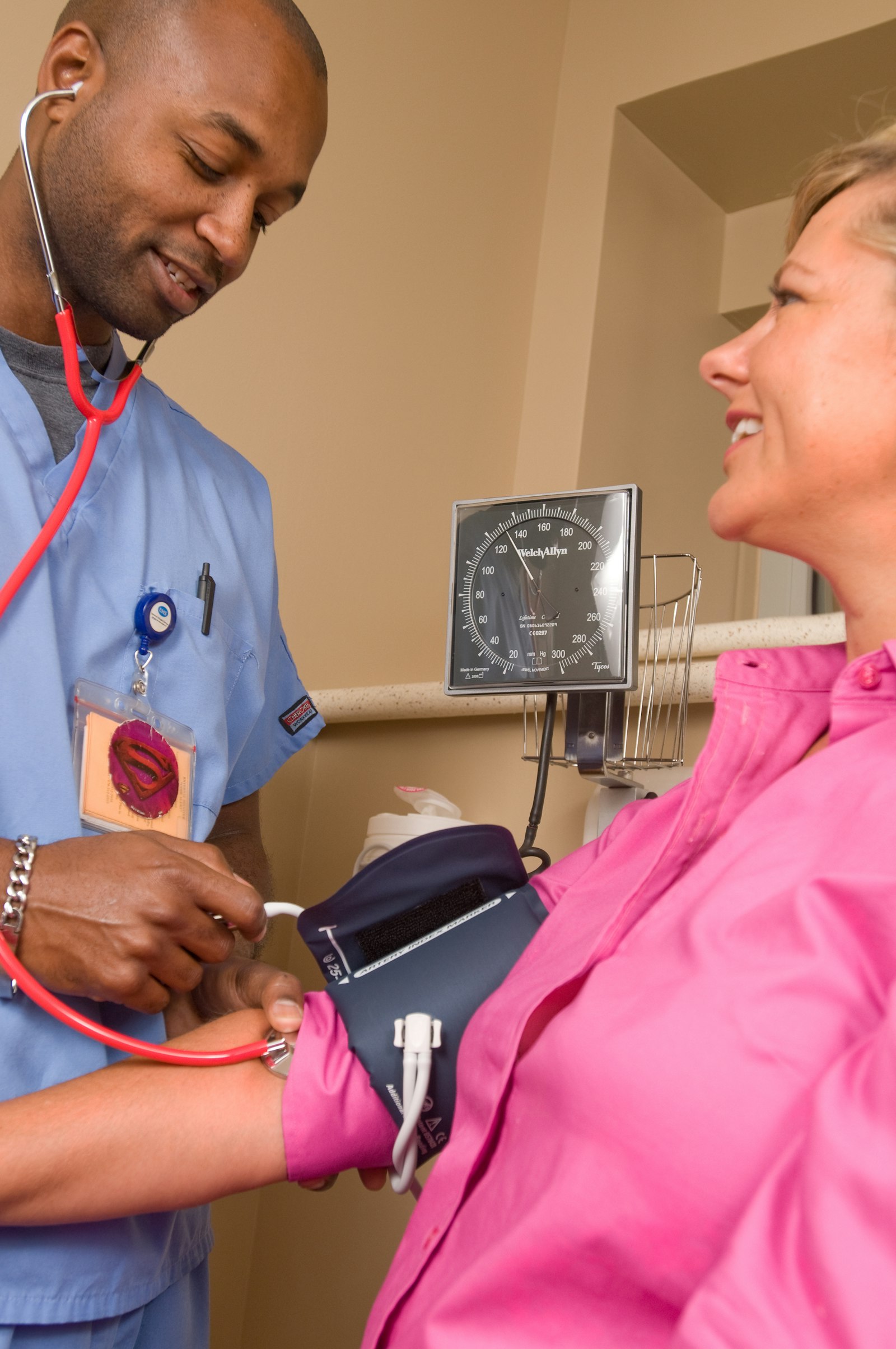 Blood pressure check during a health screening · illustrative photo