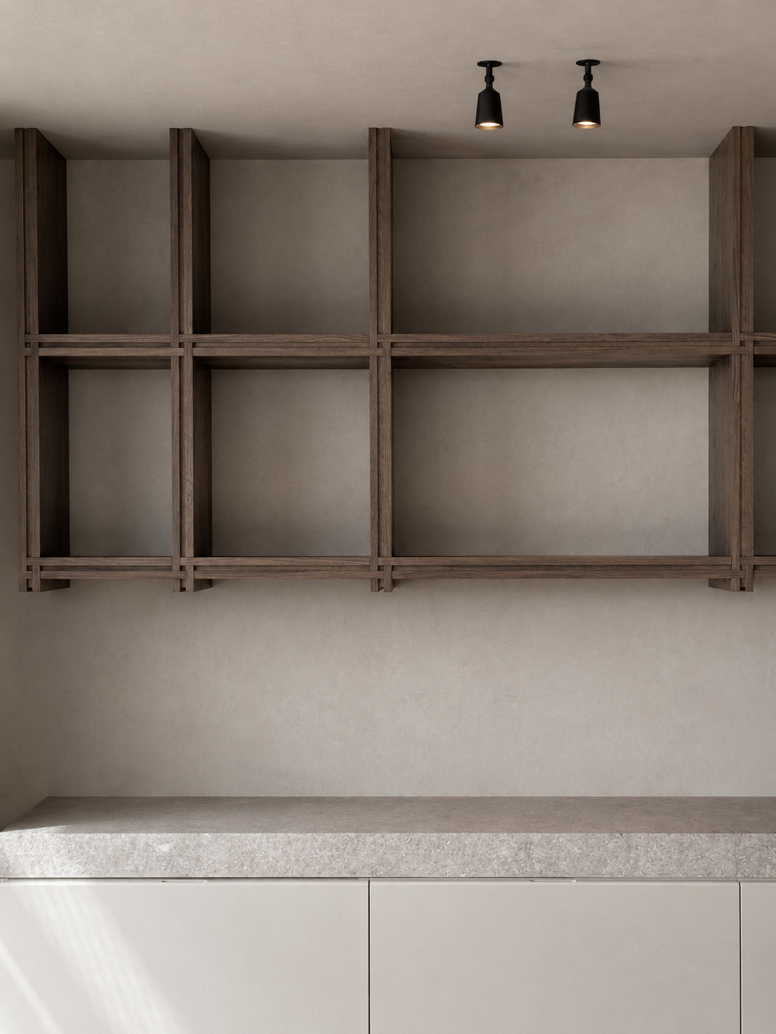 Geometric open-shelving joinery and stone work surface at Coastal Residence