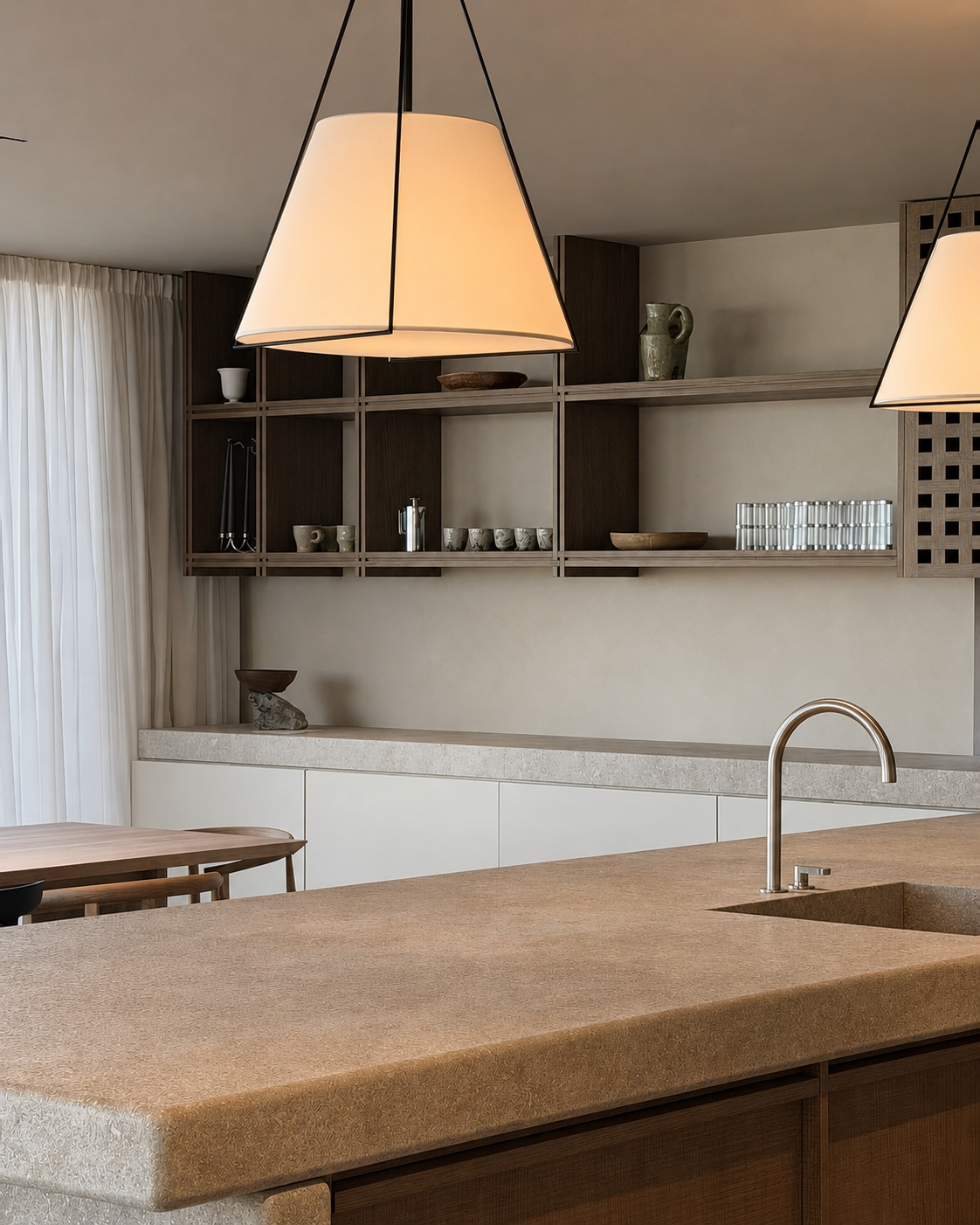 Kitchen joinery with open shelving and stone work surfaces at Coastal Residence