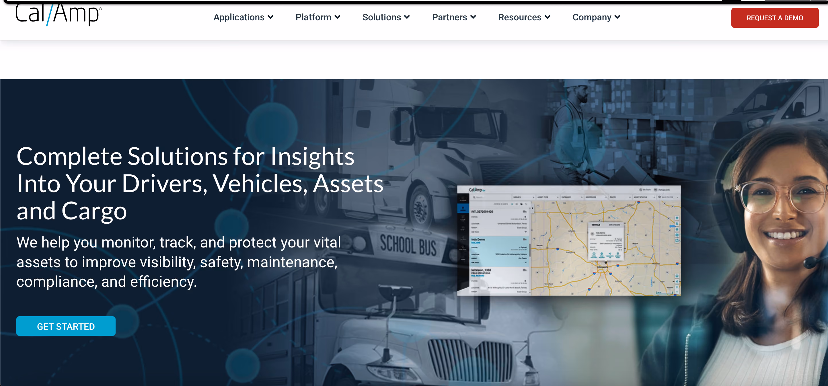 Website header with a smiling woman wearing a headset, map interface, and trucks in background.