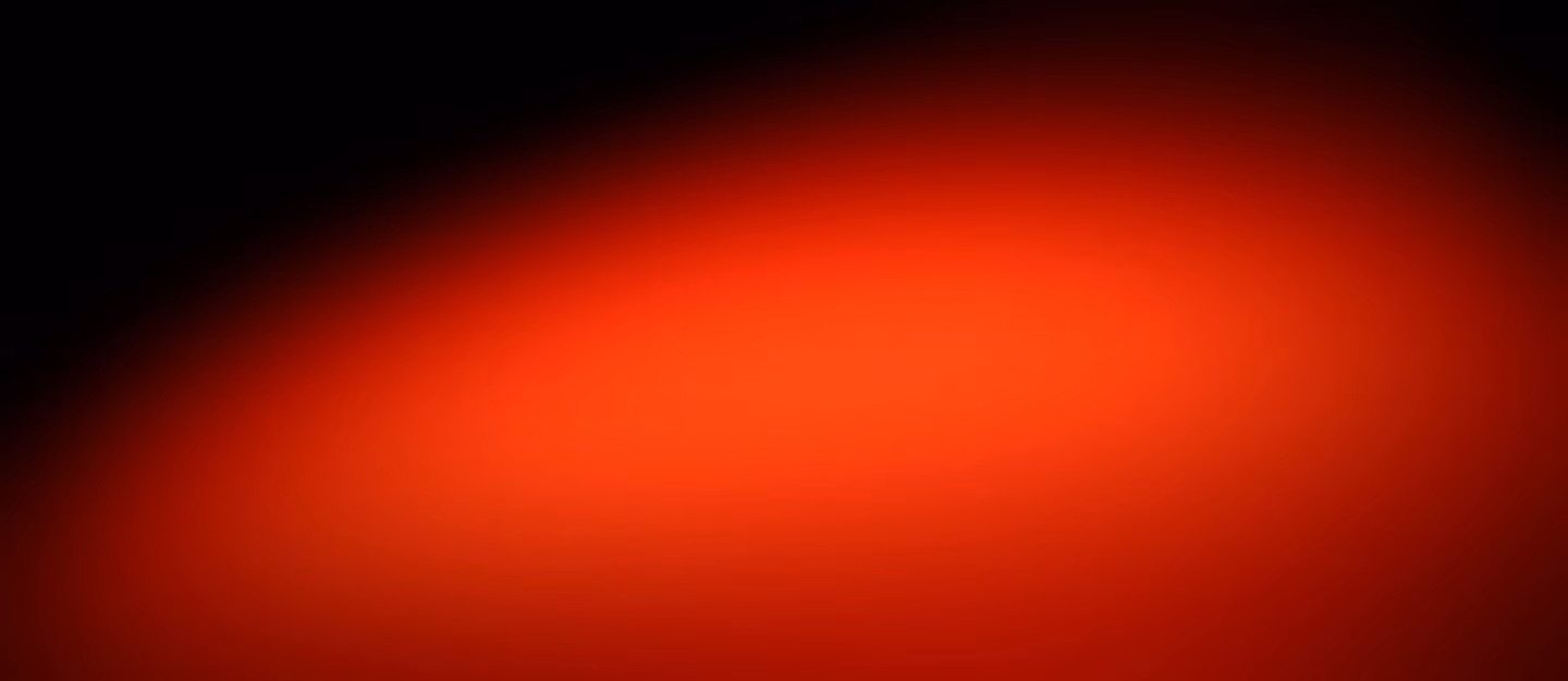 Gradient background transitioning from dark black to bright orange.