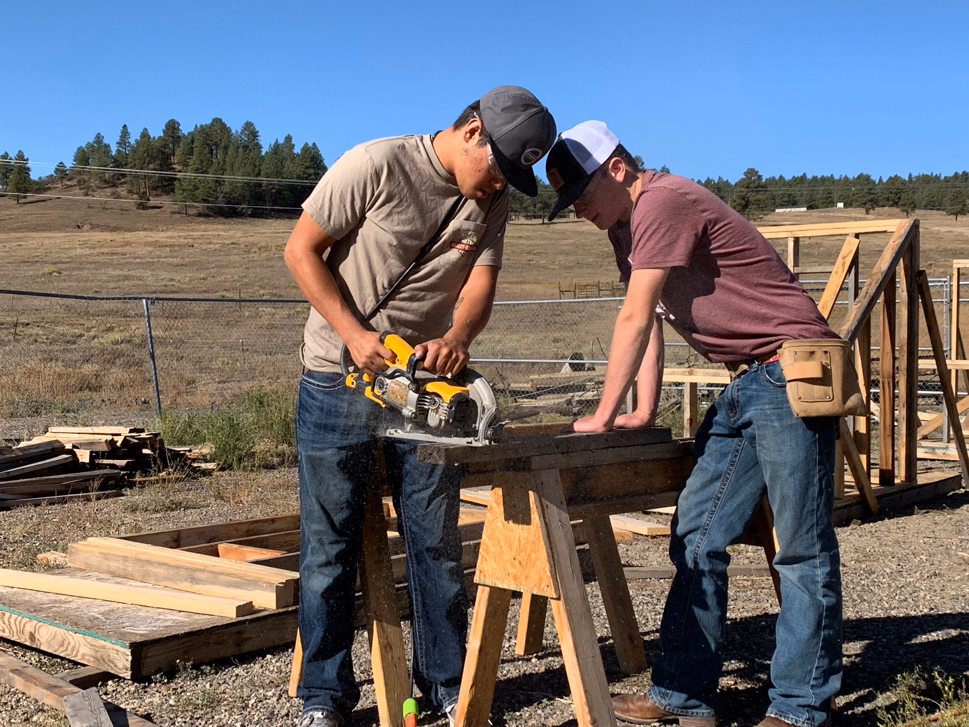 Students working outdoors on a build day in Pagosa Springs
