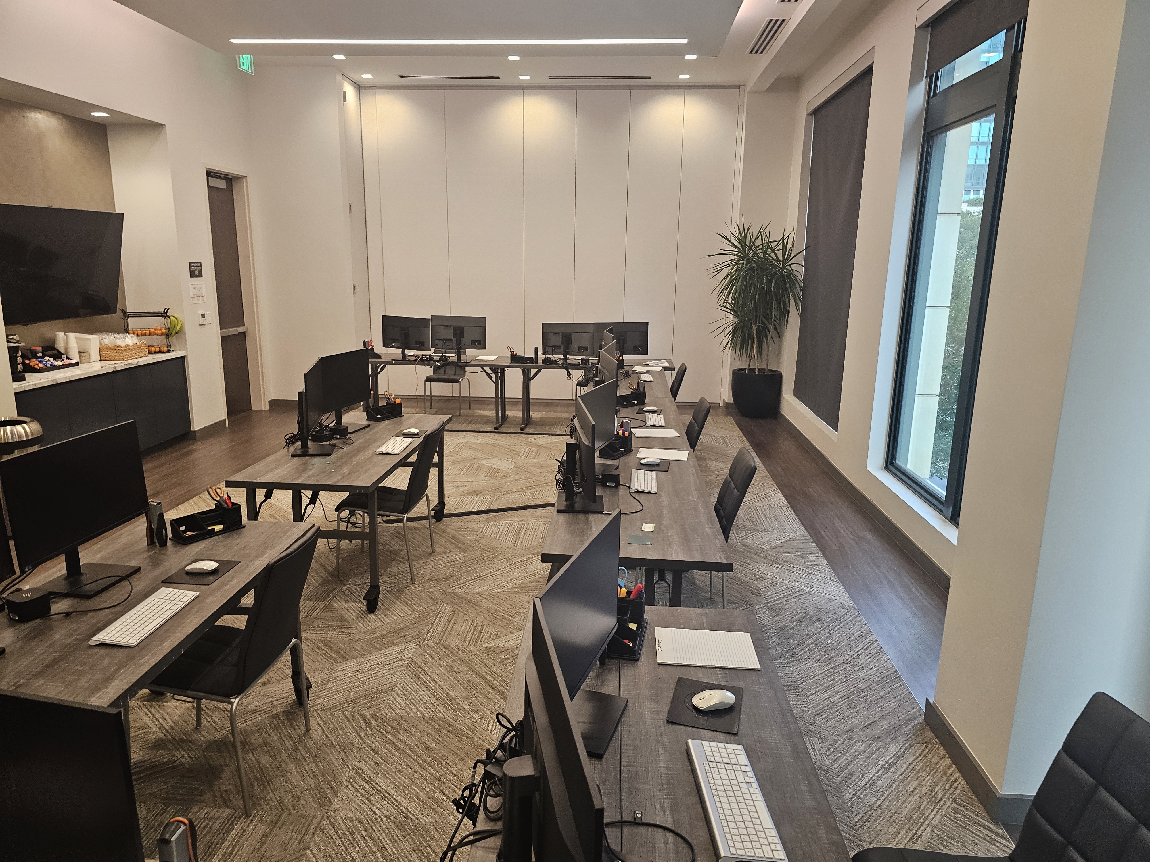 Trial-ready war room with dual-monitor workstations