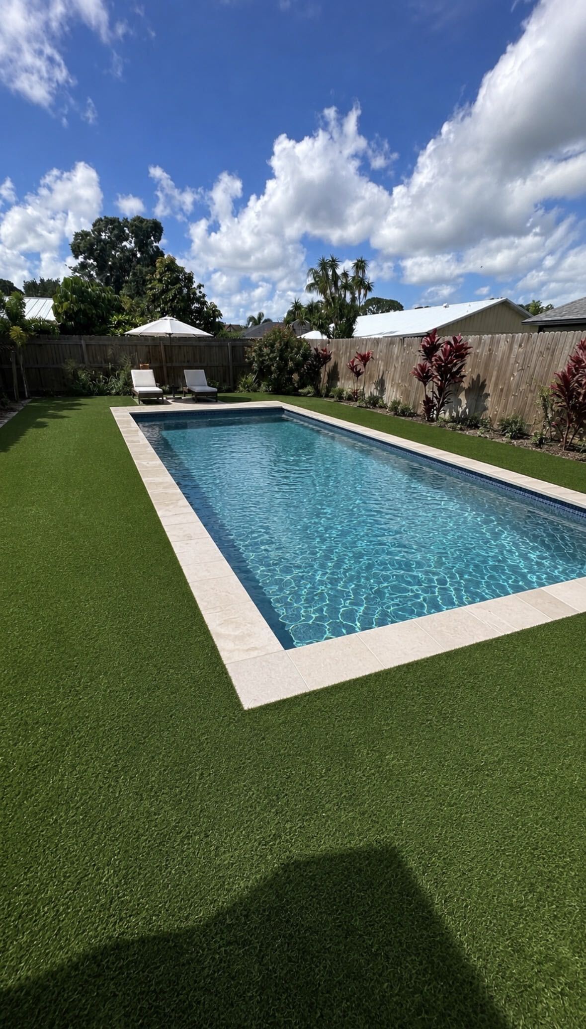 Clean artificial turf pool surround Sarasota