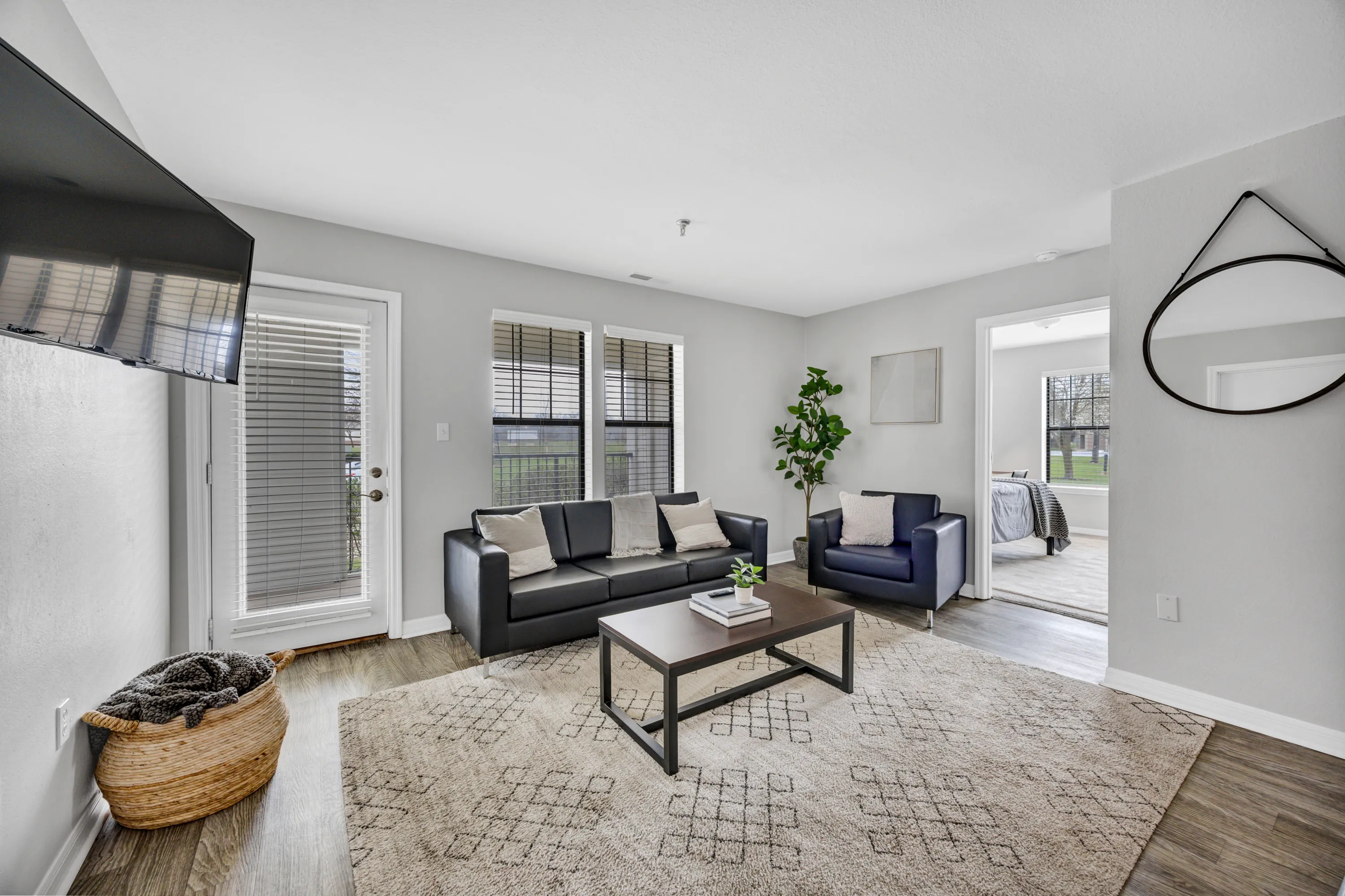 Furnished living room in the B1 Premium apartment at The Foundry