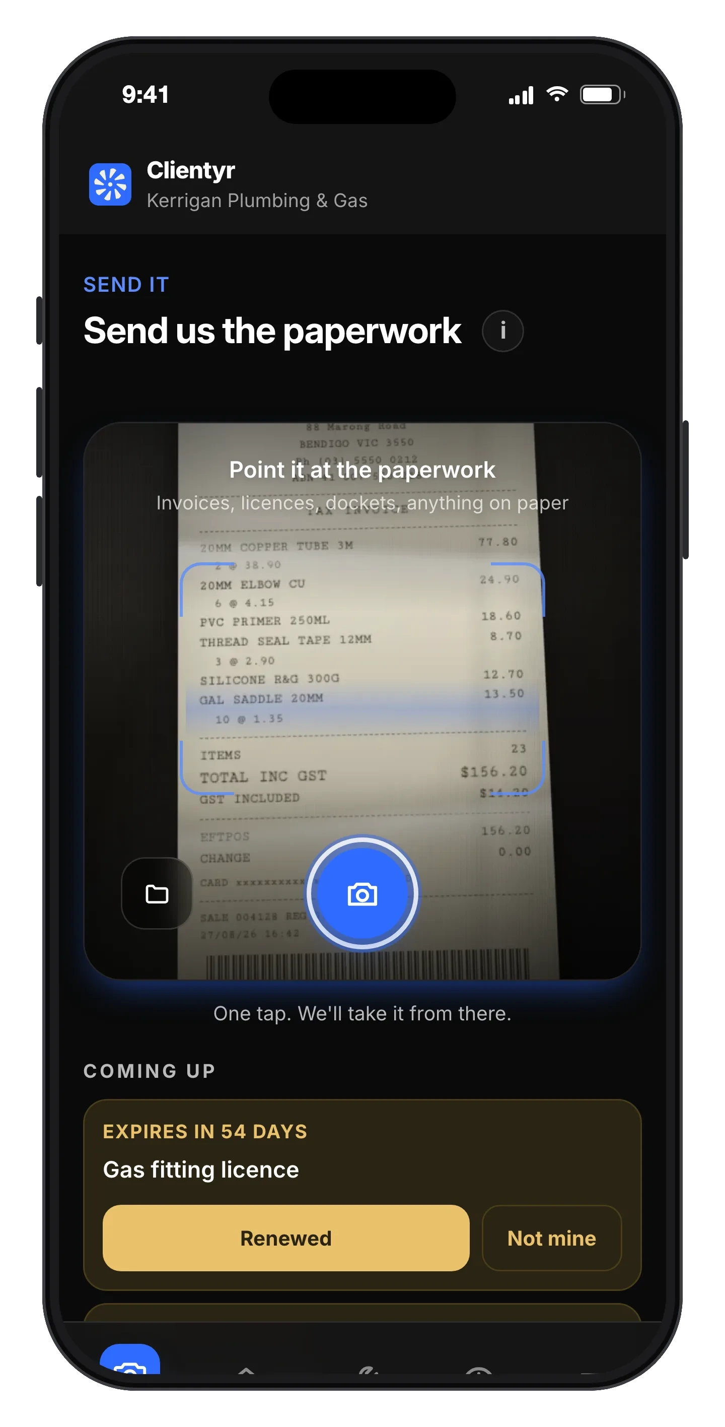 The Send It screen on a phone, camera pointed at a hardware store docket with the scan brackets over it