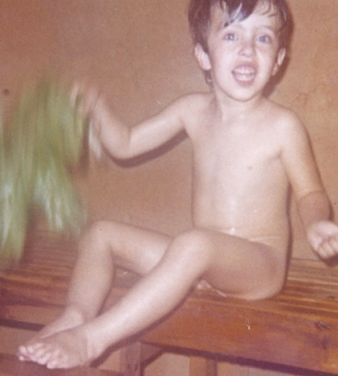Petri Knuuttila as a child in a Finnish sauna