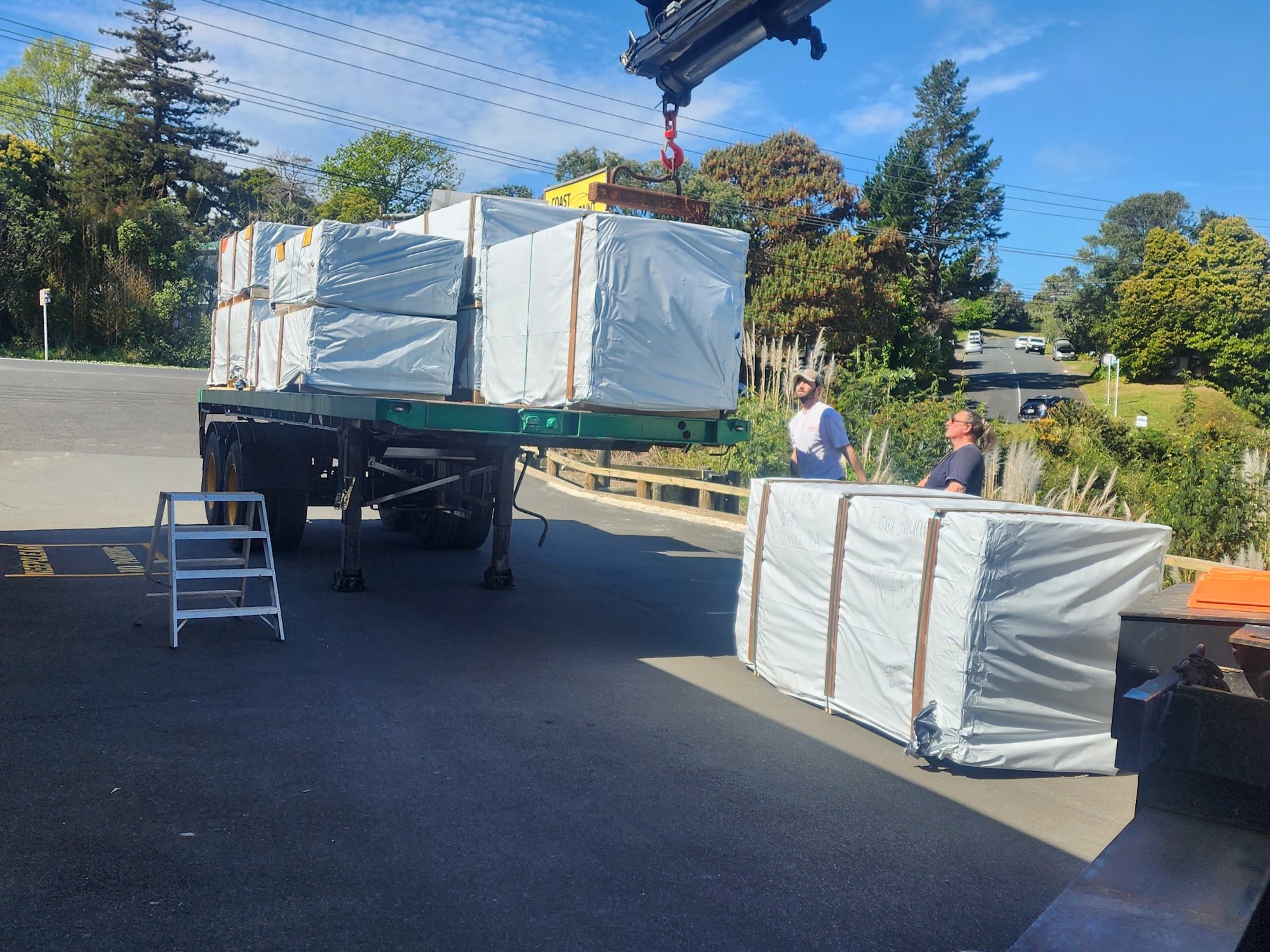 Finnish timber arriving at the workshop by crane