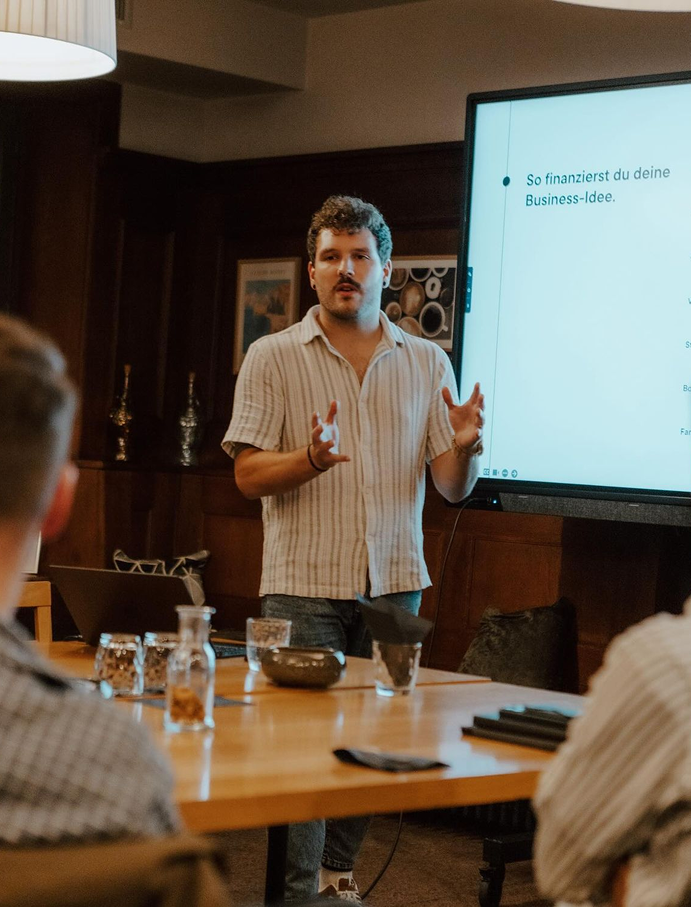 Person presenting in office