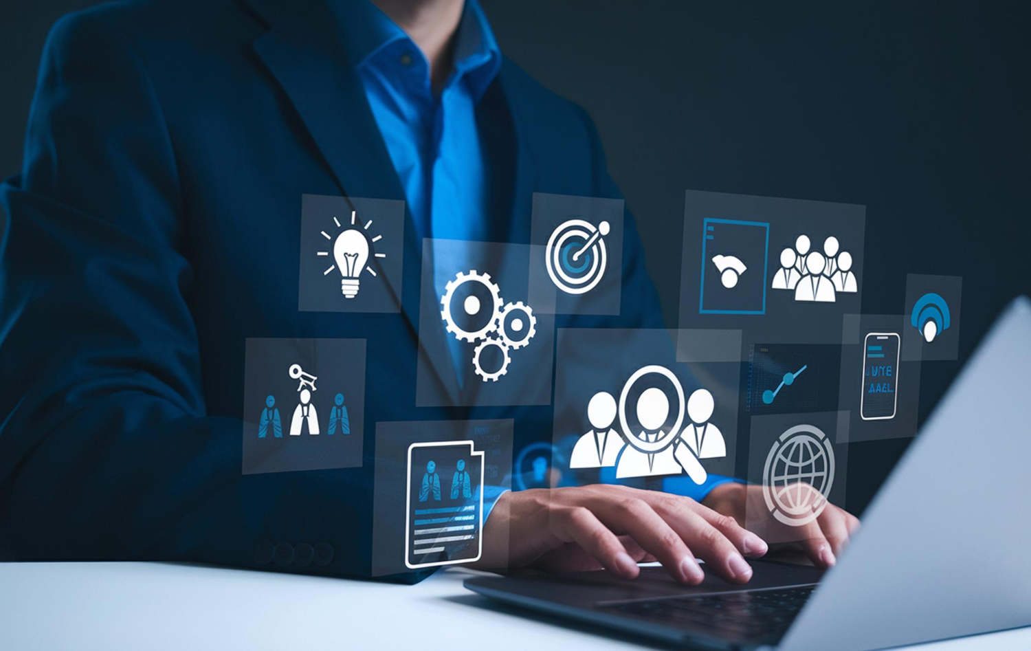 Person in a blue shirt and dark blazer typing on a laptop with floating digital icons representing business concepts like innovation, teamwork, target, settings, connectivity, and global networking.