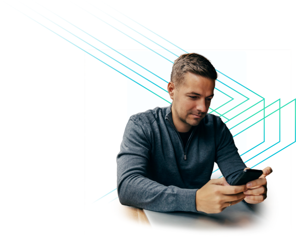 A man on a cell phone representing reducing API Sprawl at a Global Telecom Provider