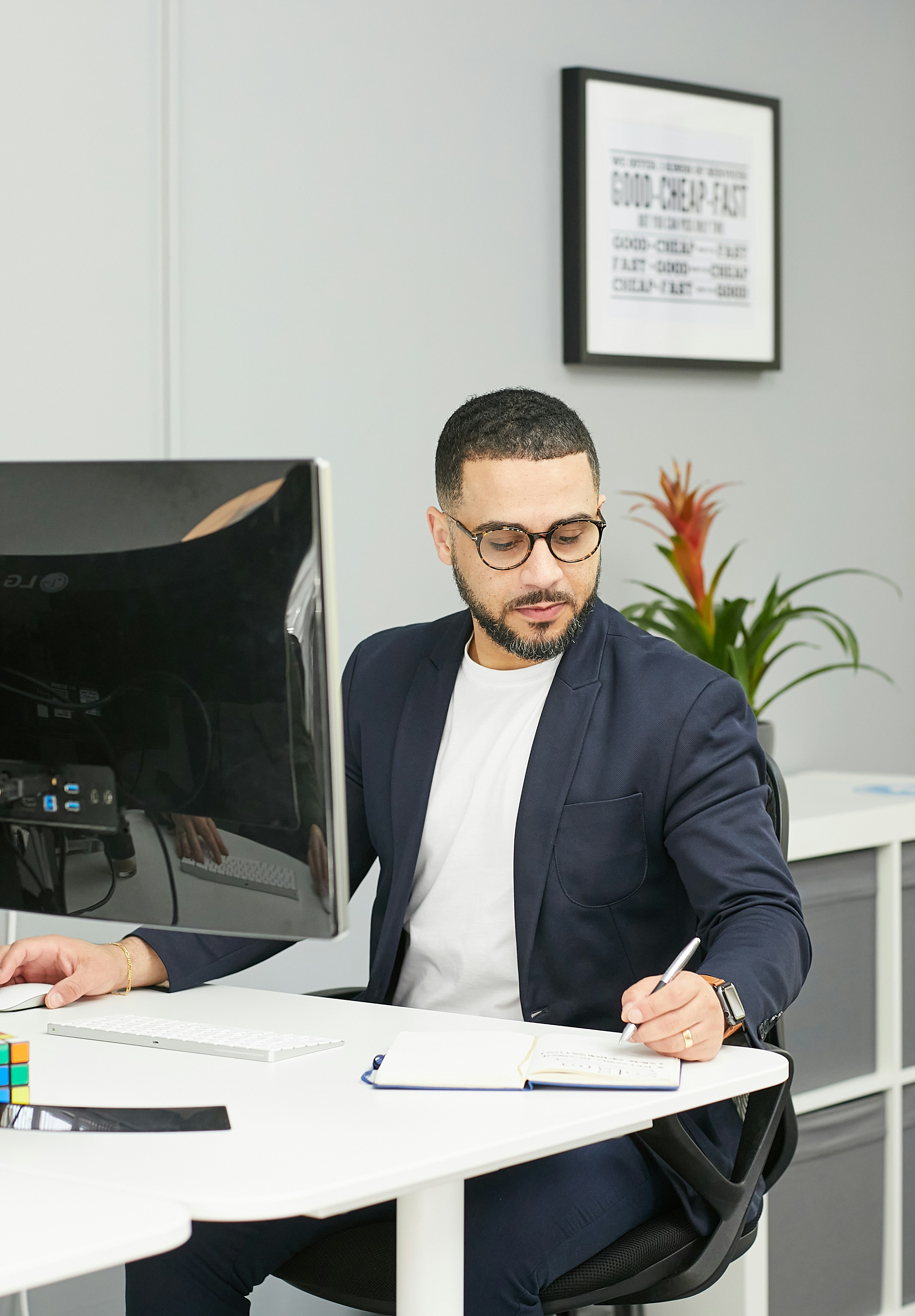 Business & professional services apprentice in training working at a desk