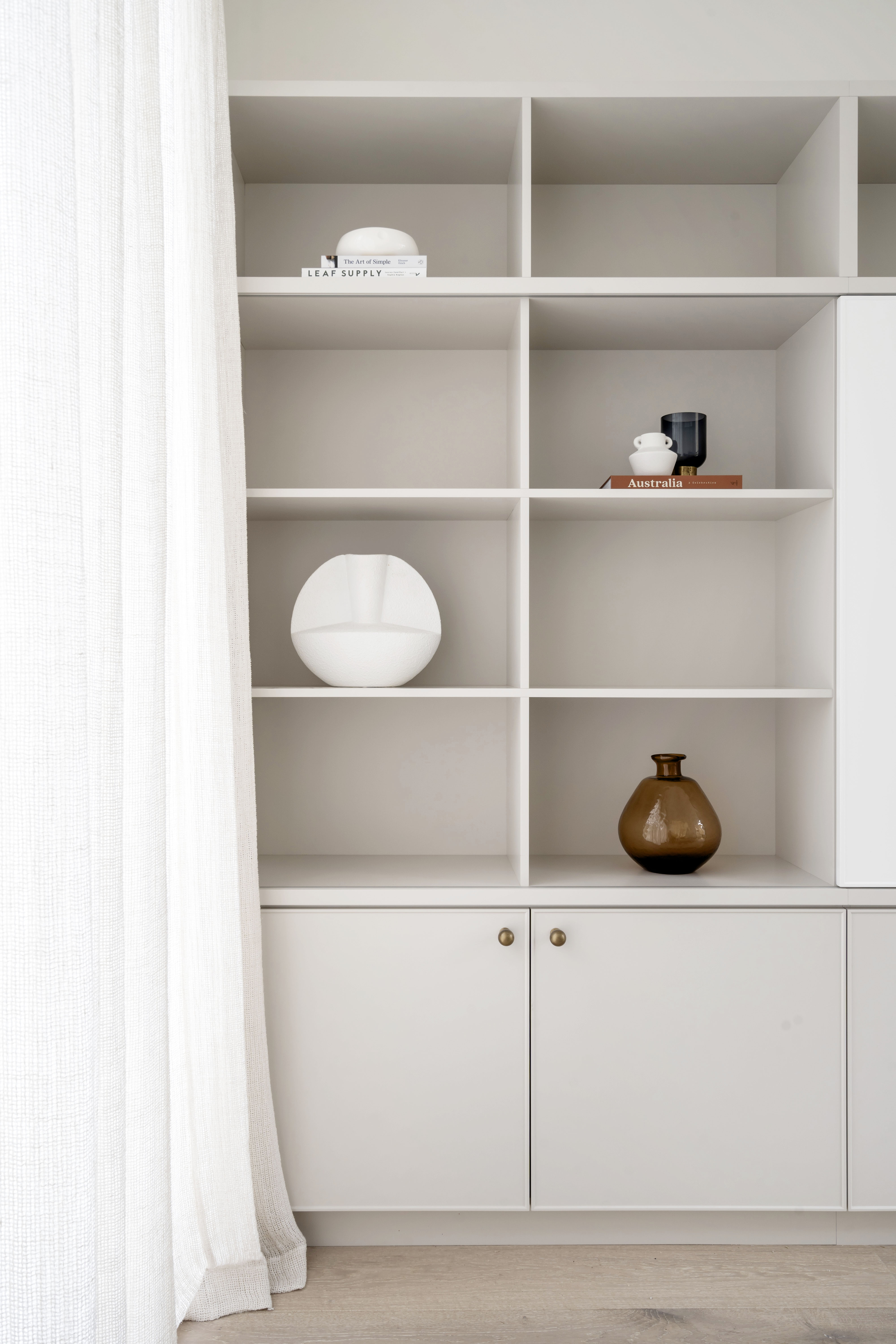 Styled shelving display with decorative objects