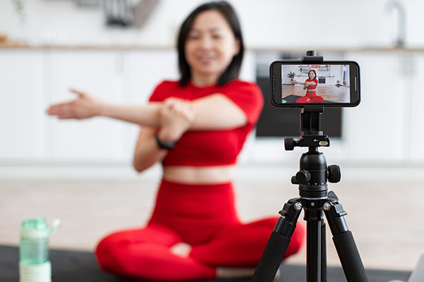 a woman in red doing yoga