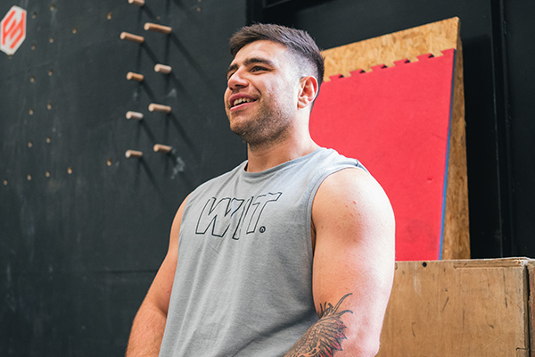 a man in a tank top