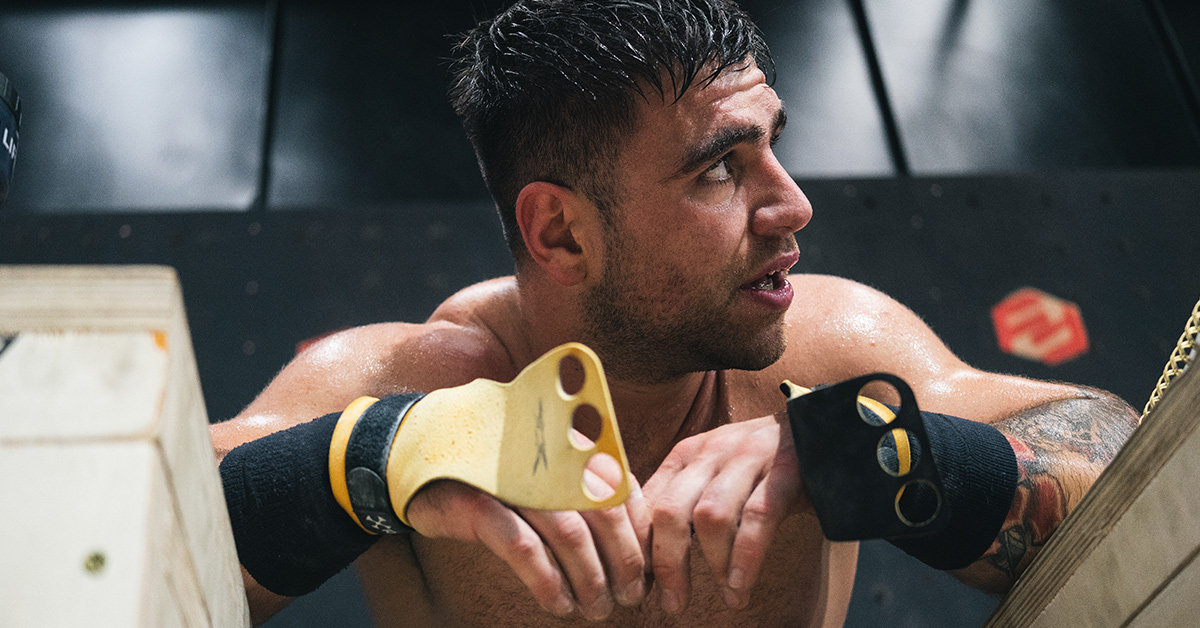a man holding a yellow and black device
