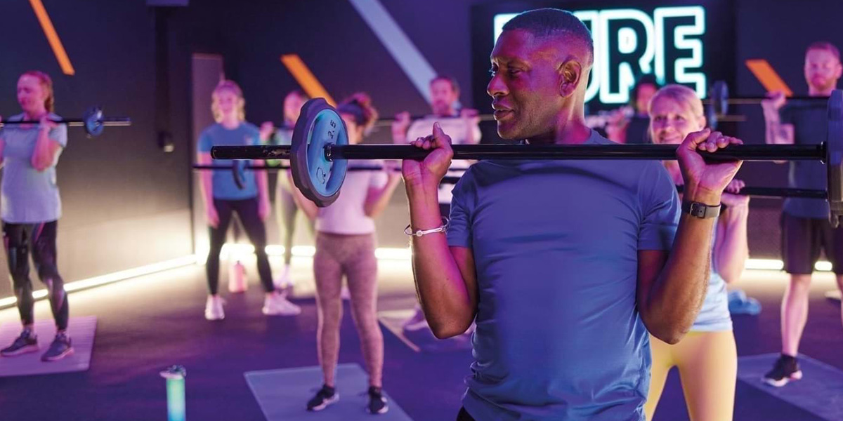 a man lifting a barbell