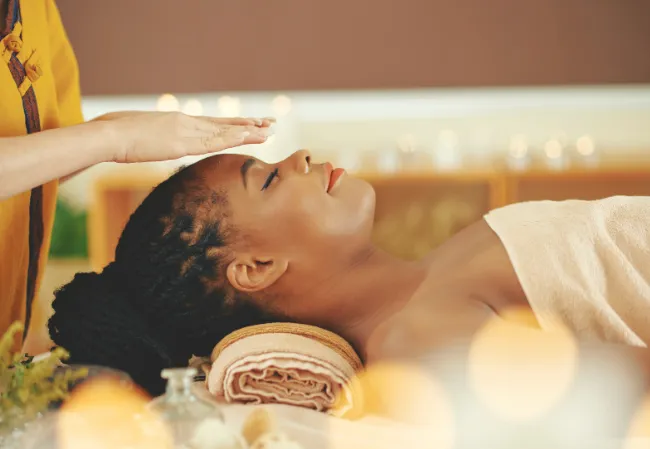 Reiki session on a client