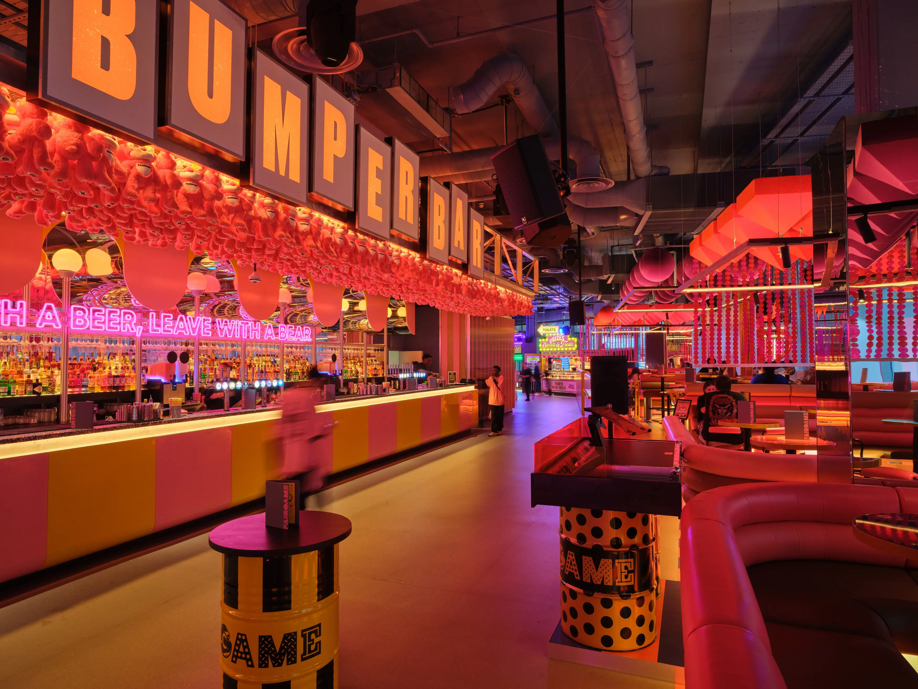 The neon-lit Bumper Bar and pink booths at One New Change