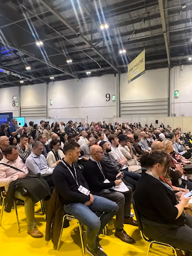 The Risk Theater attendees seated for the panel presentation at #RISK London