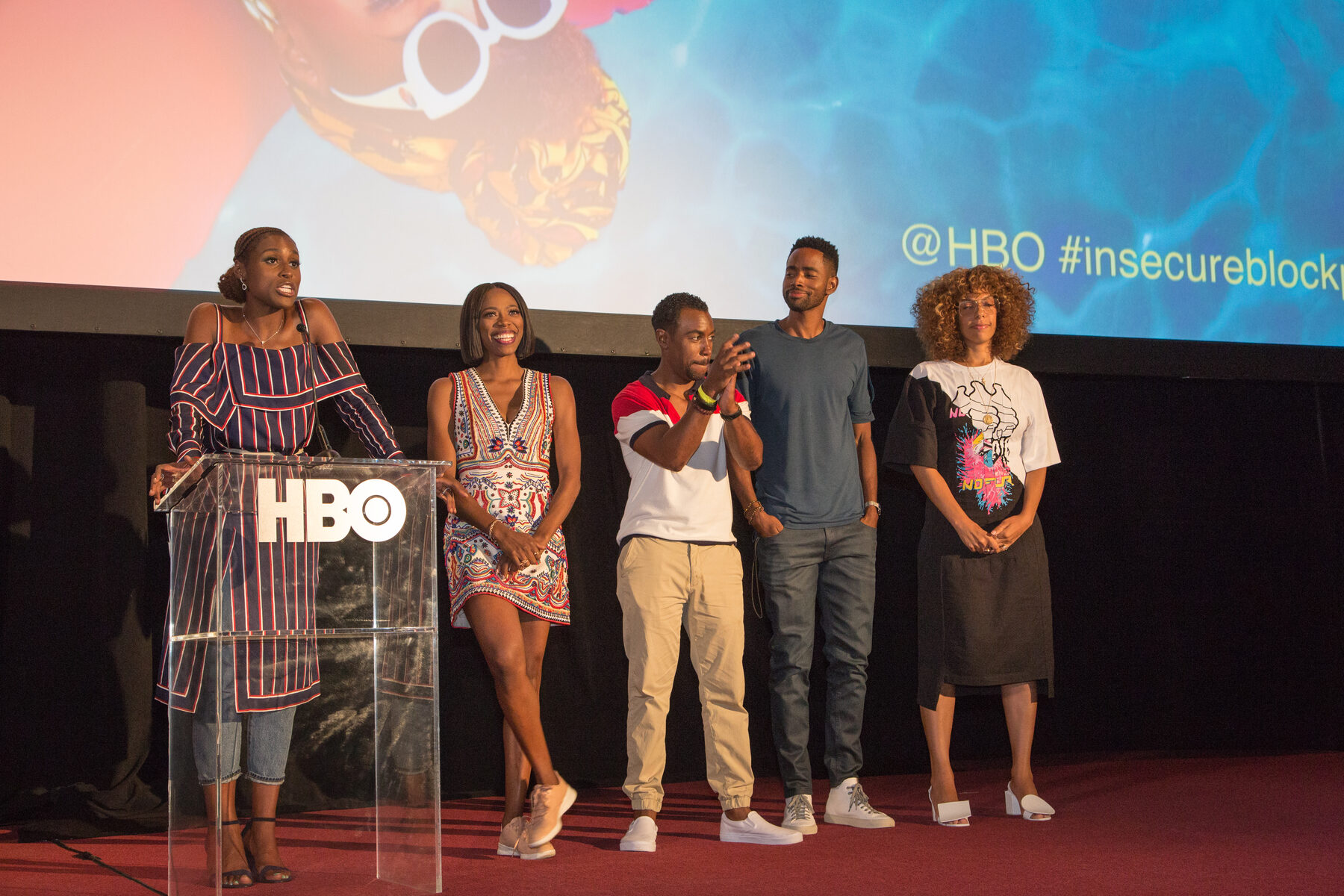 Cast on stage at the HBO podium