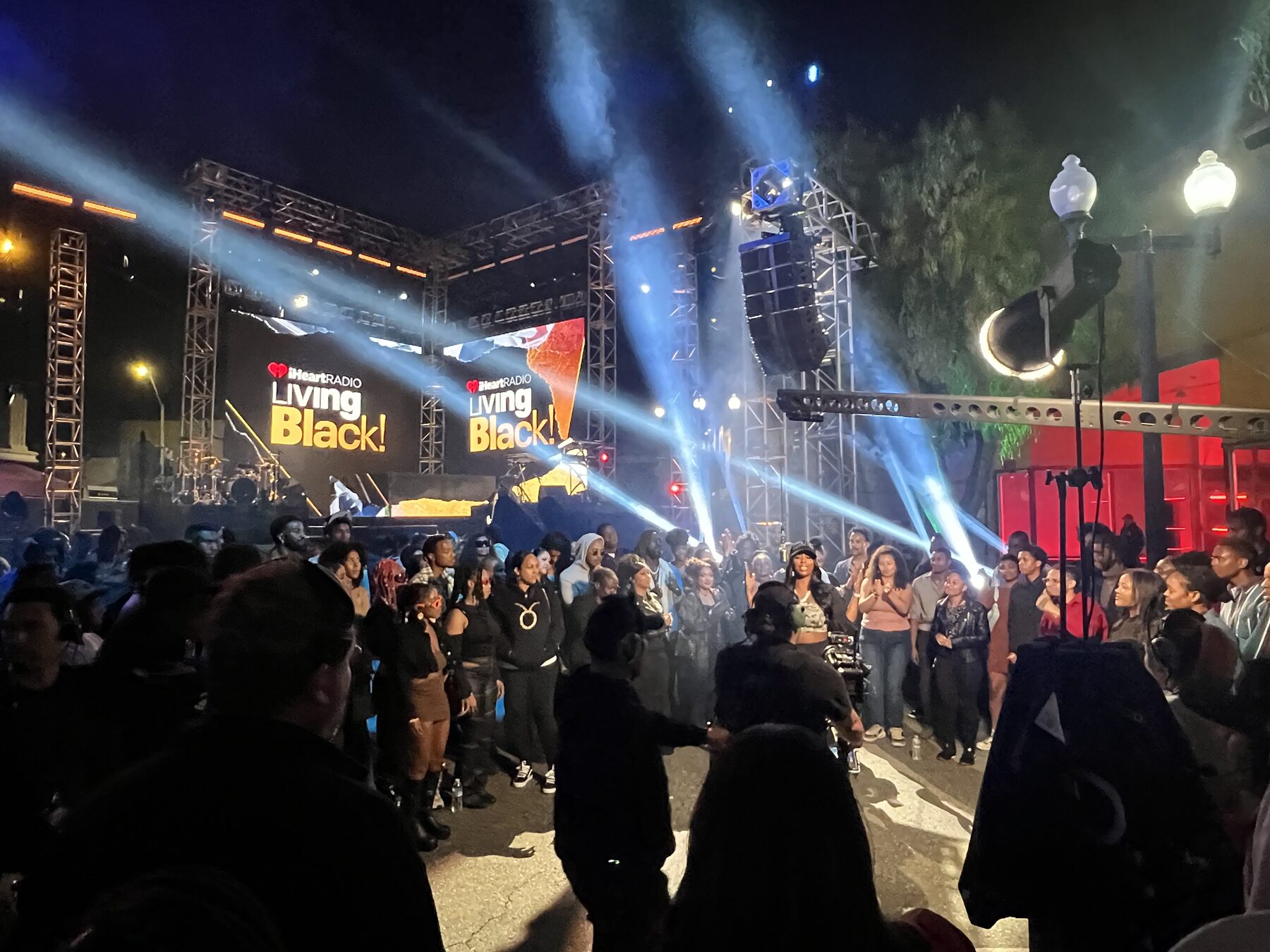 Crowd in front of the Living Black stage at night