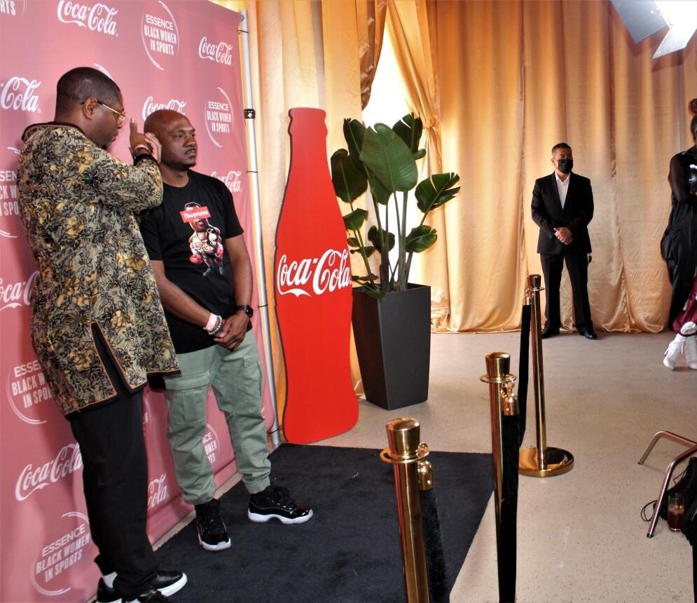 Group photo on the branded backdrop