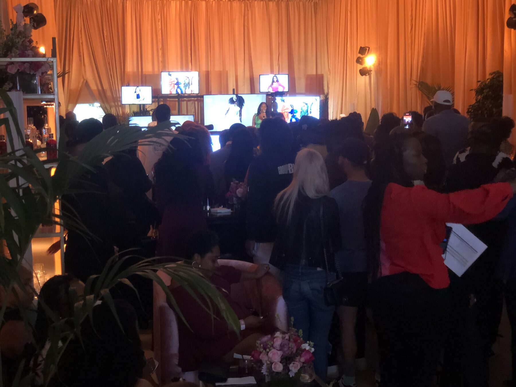 Guests in the draped room during the Essence activation