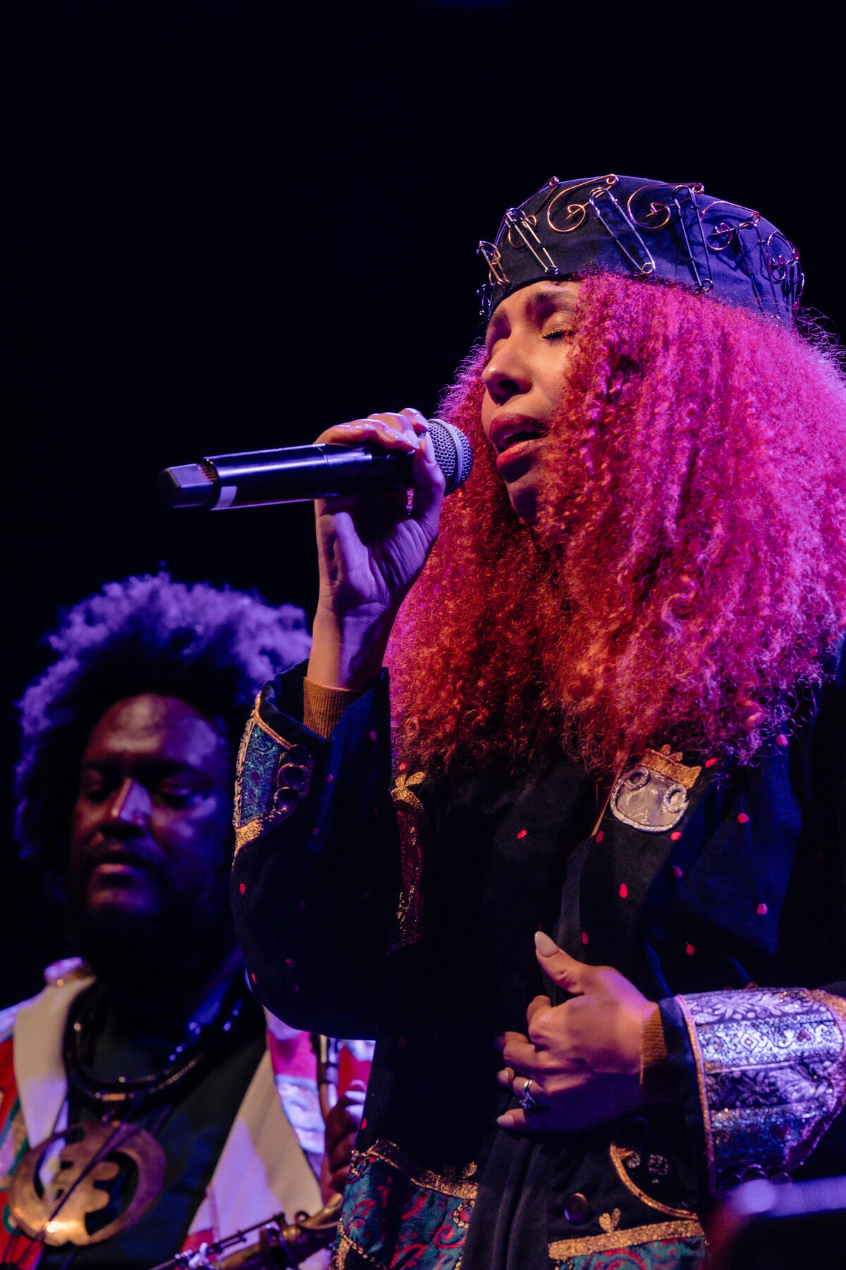 Vocalist performing at the benefit concert