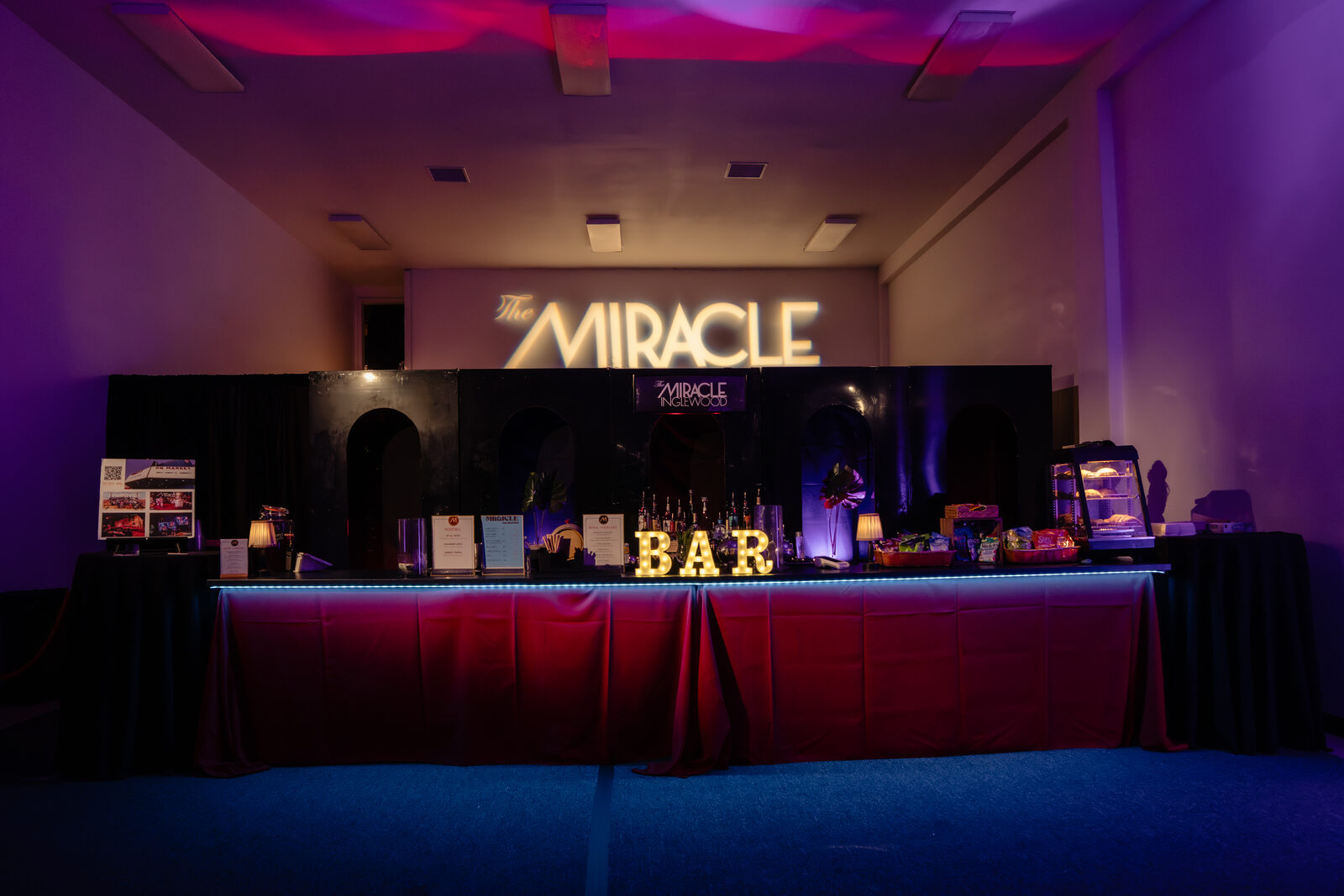 The lounge bar set up under the Miracle sign