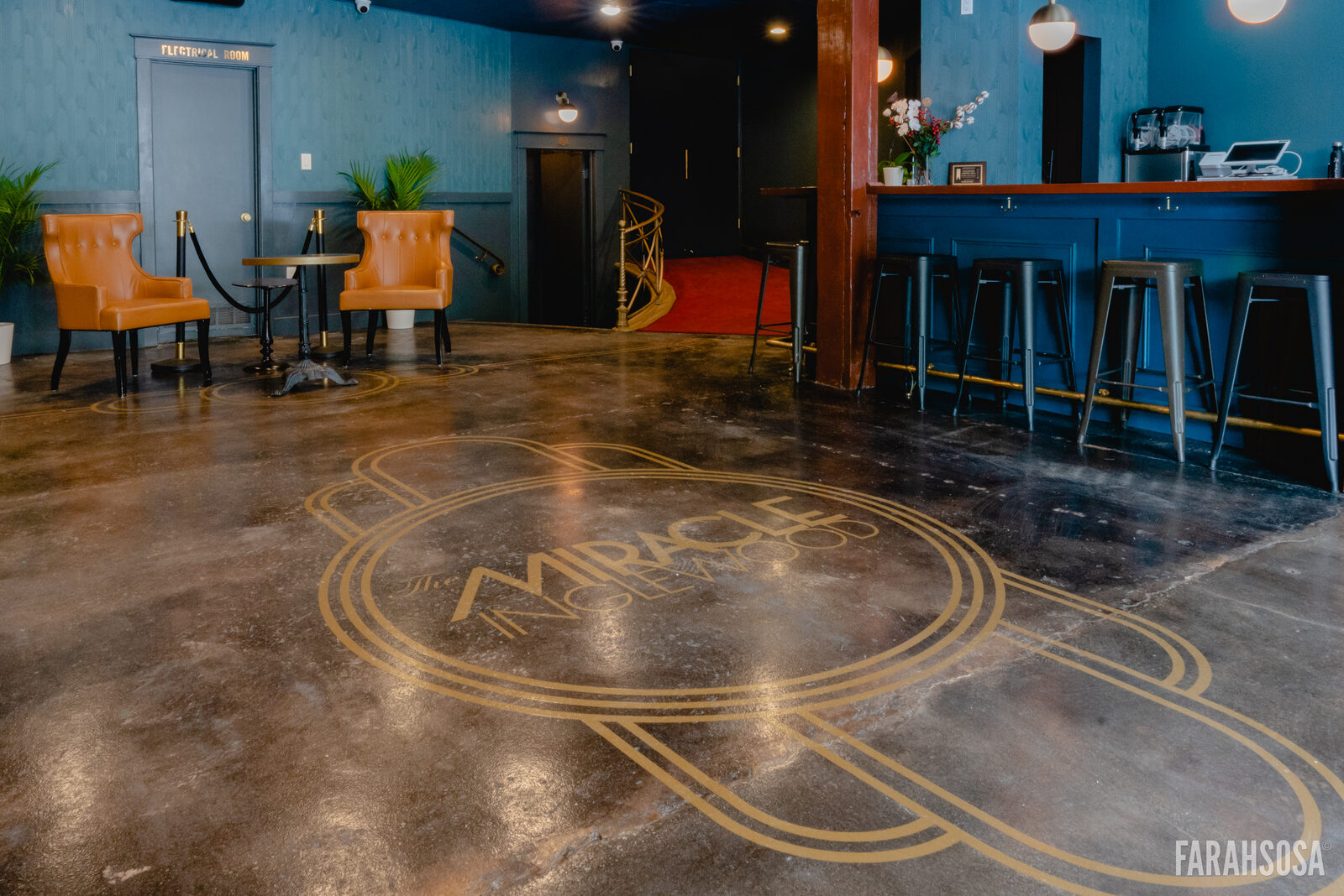 Lobby seating and bar stools by the entrance