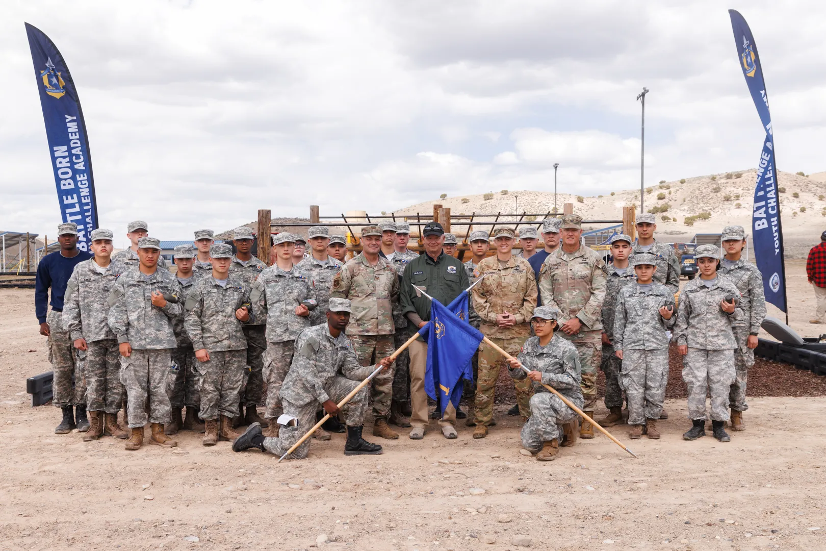 BBYCA cadets and staff group photo with academy banners