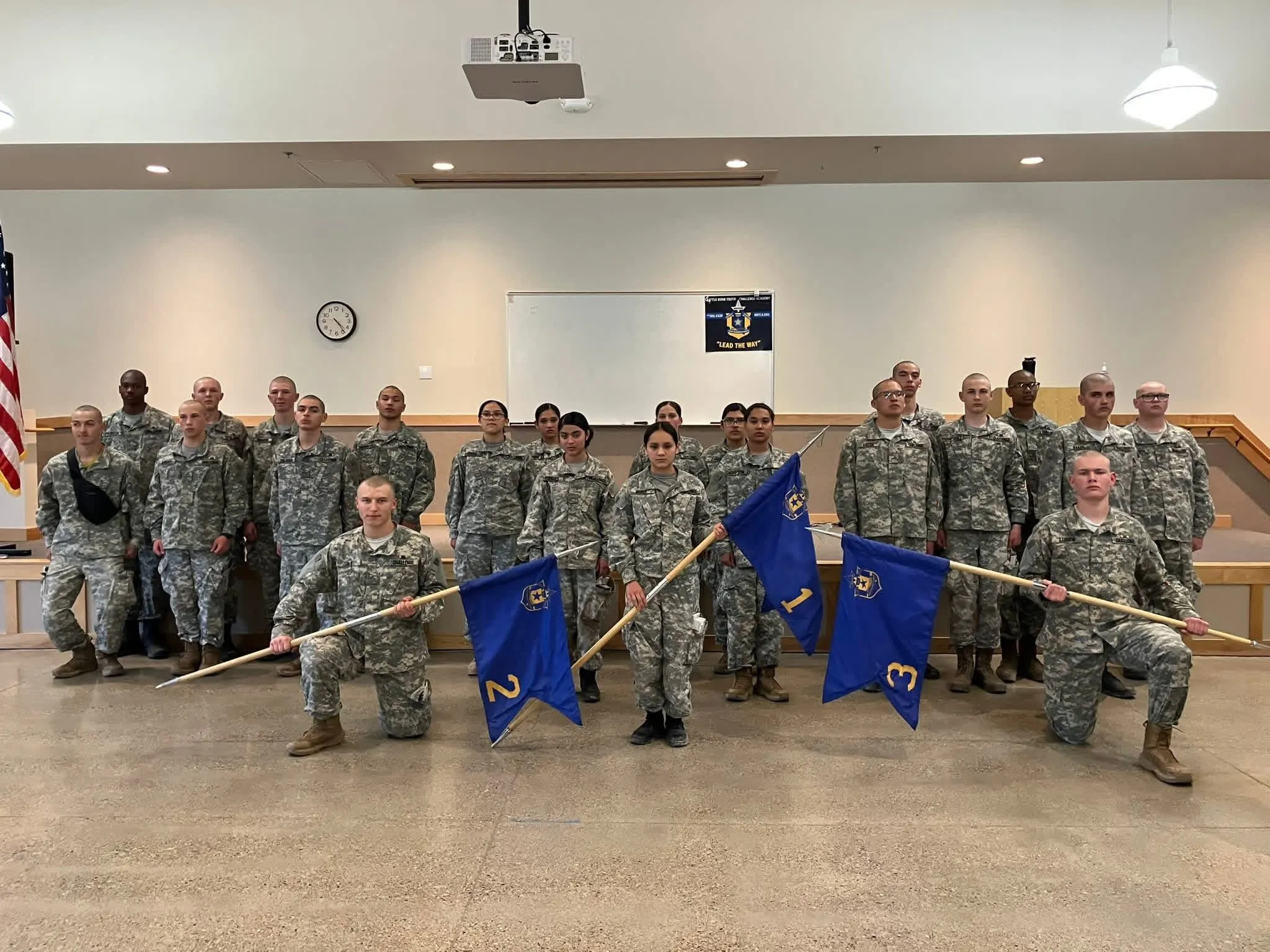 BBYCA platoons posing with their numbered guidons