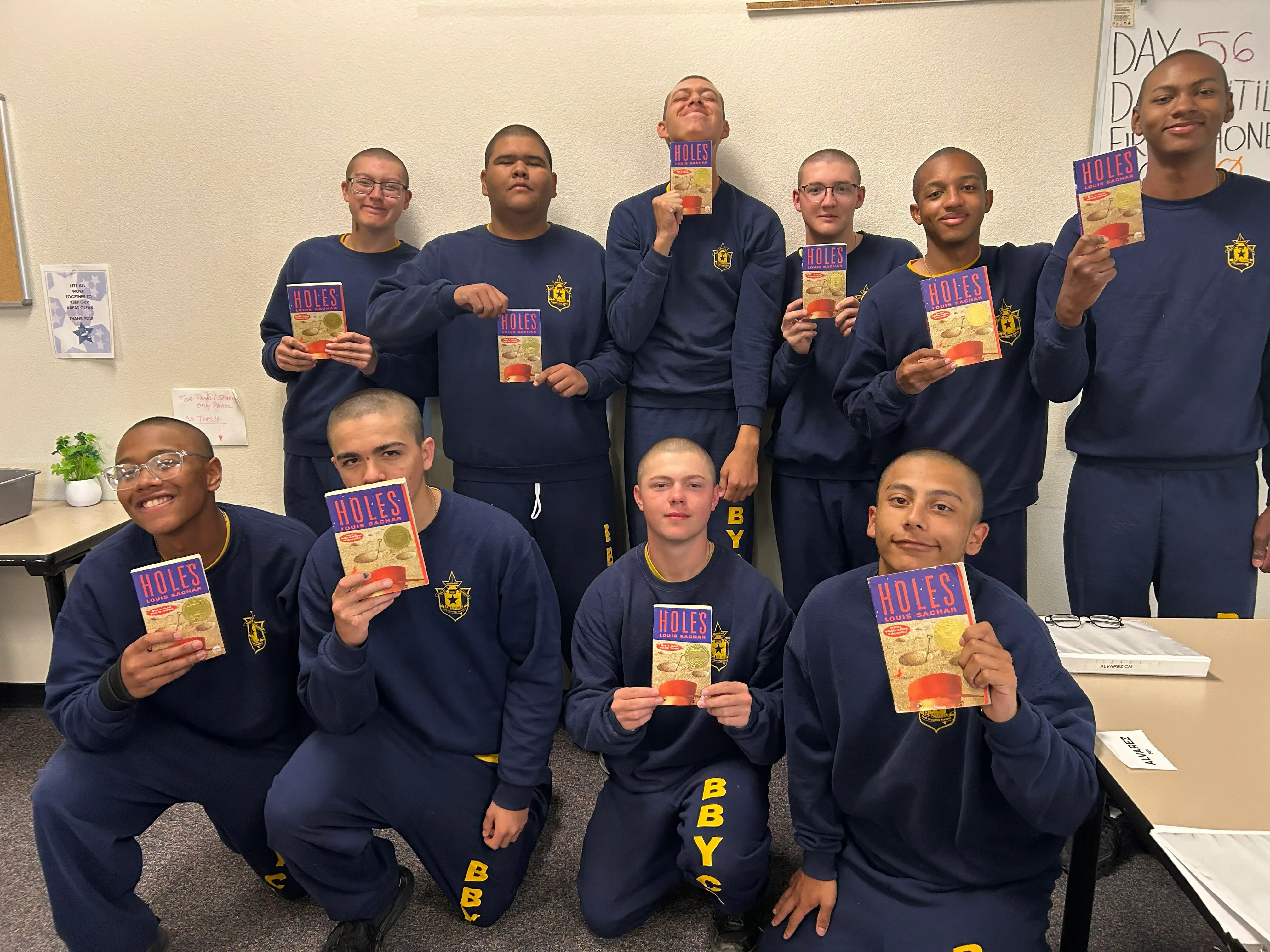 BBYCA cadets holding copies of the novel Holes in class